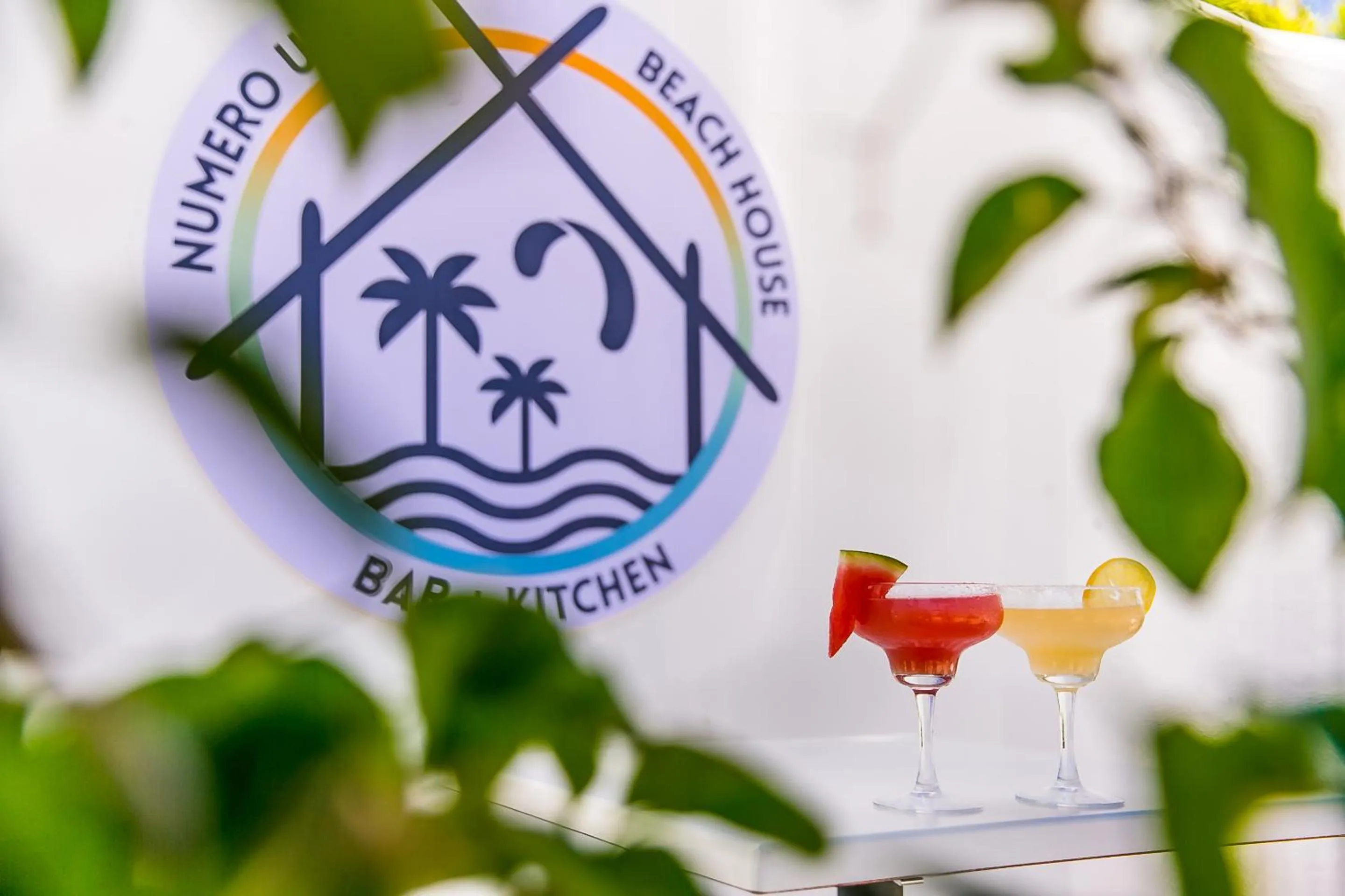 Property logo or sign in Numero Uno Beach House