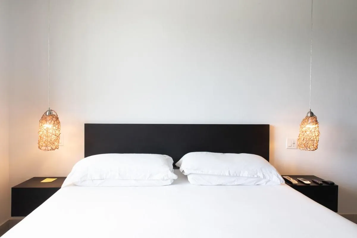 Bed in Numero Uno Beach House