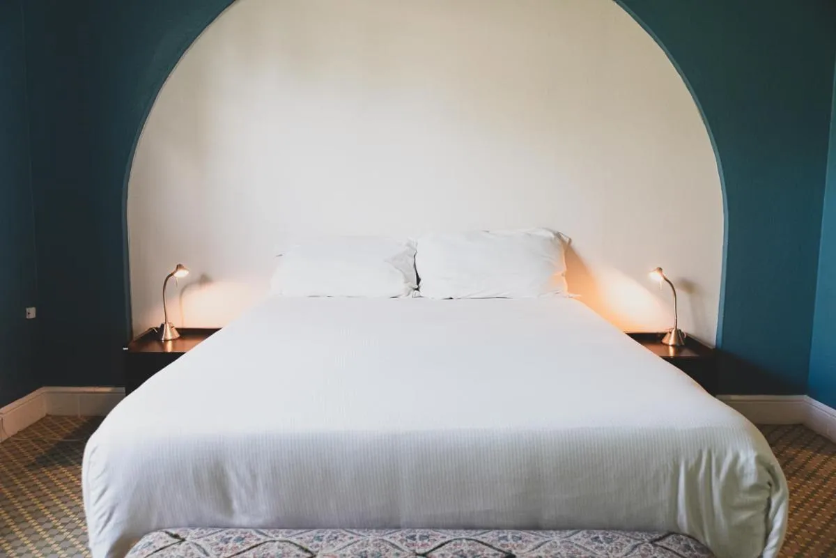 Bed in Numero Uno Beach House