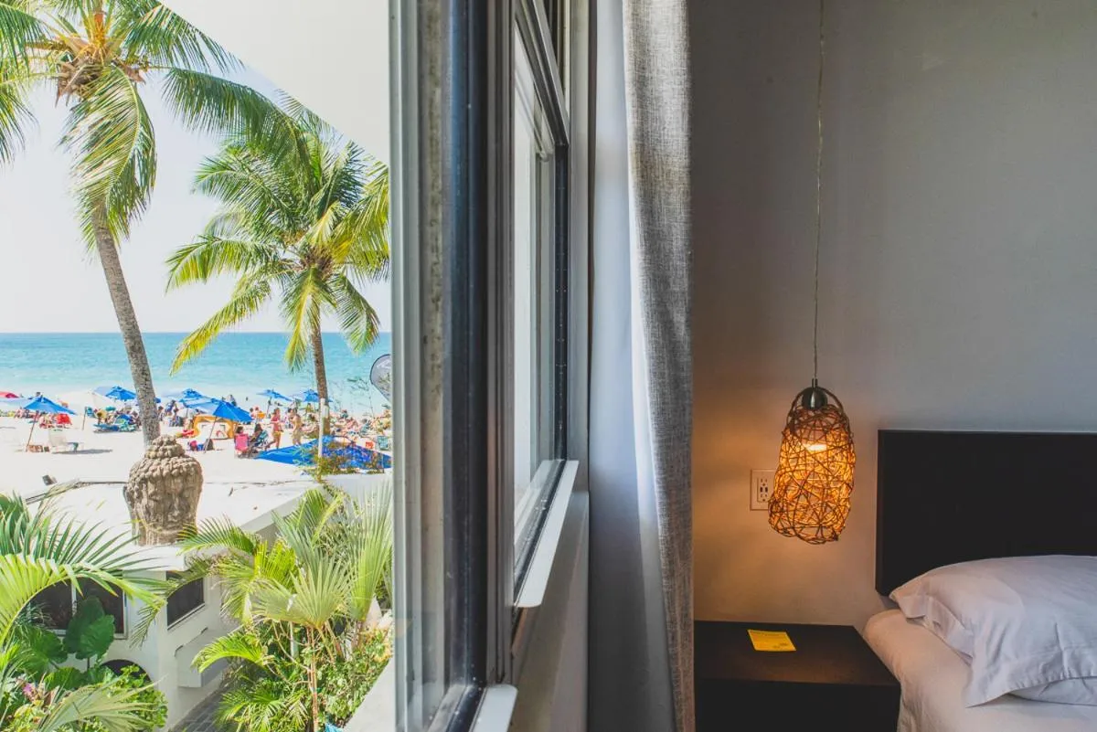 Bed in Numero Uno Beach House