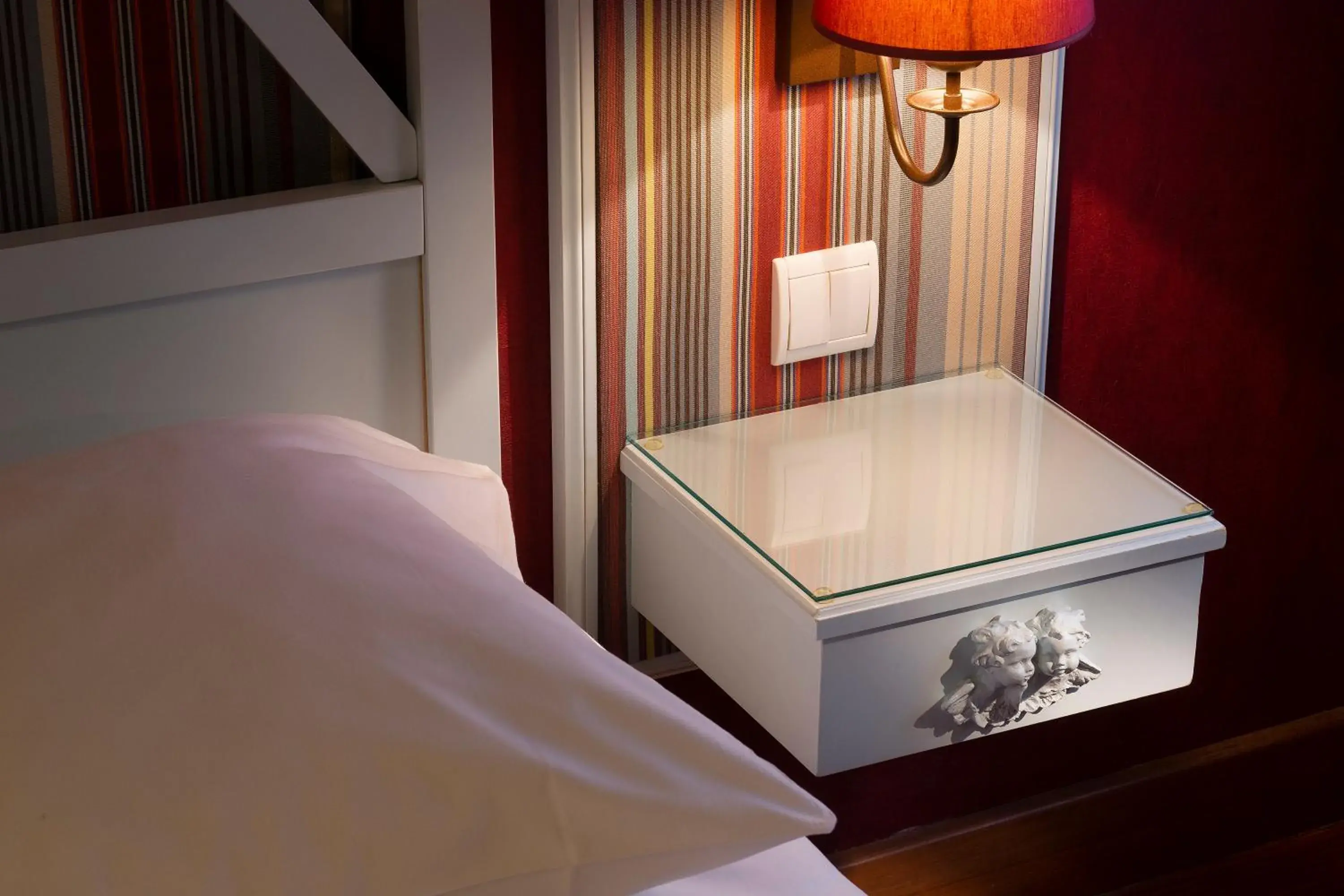 Decorative detail, Bed in Hotel Louvre Bons Enfants Decorative detail, Bed in Hotel Louvre Bons Enfants