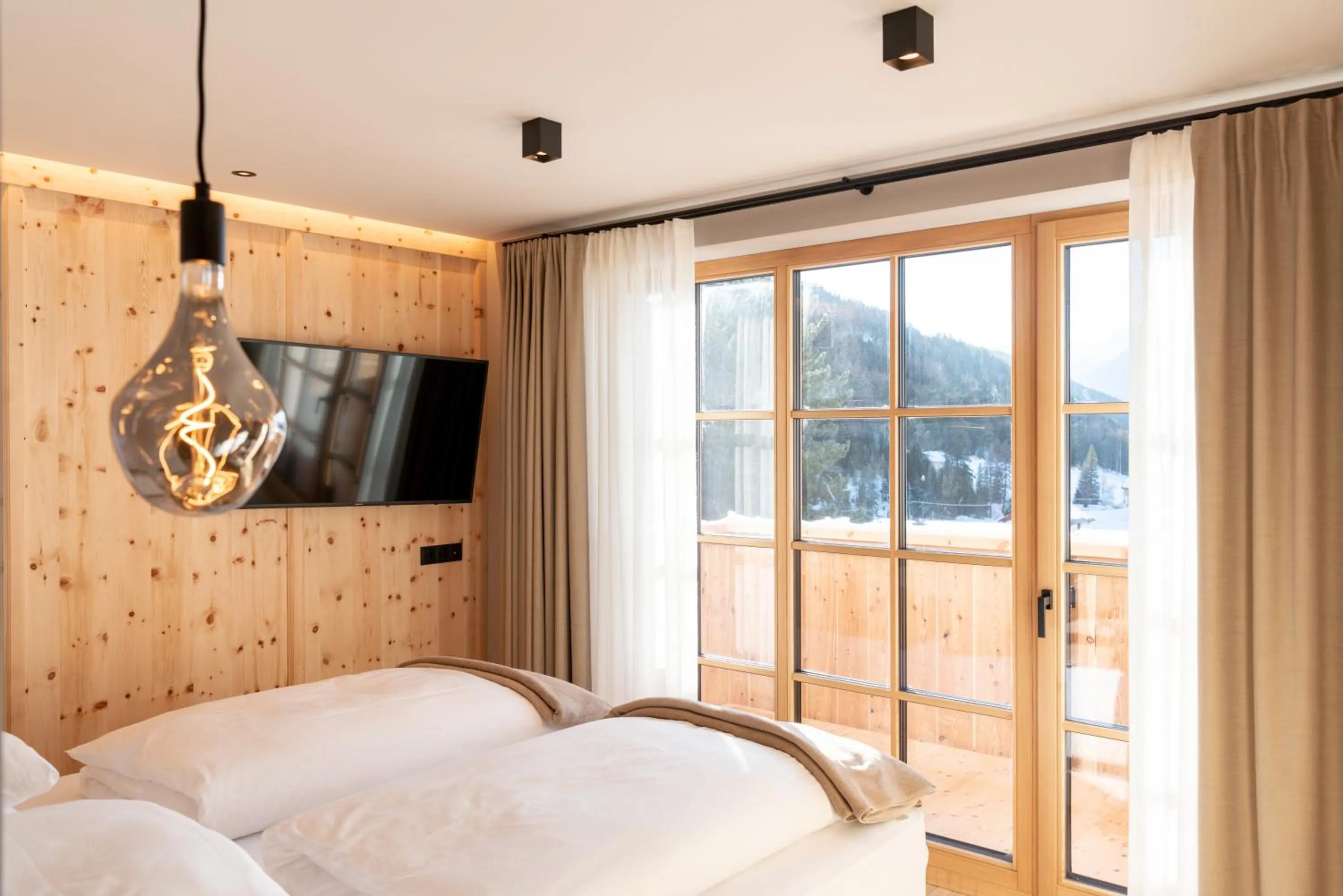 Bedroom, Bed in Penserhof - Alpine Hotel & Restaurant