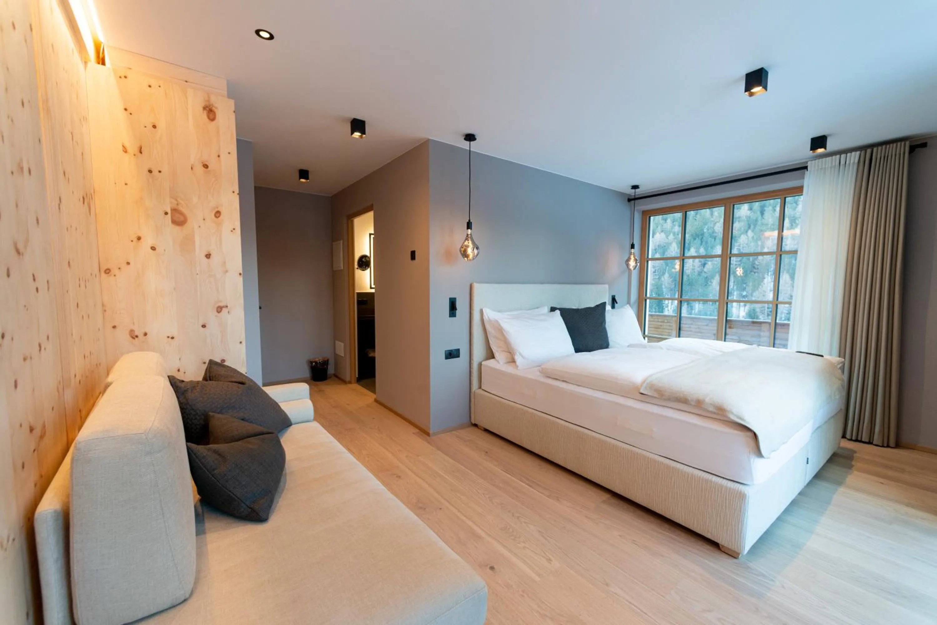 Photo of the whole room, Bed in Penserhof - Alpine Hotel & Restaurant