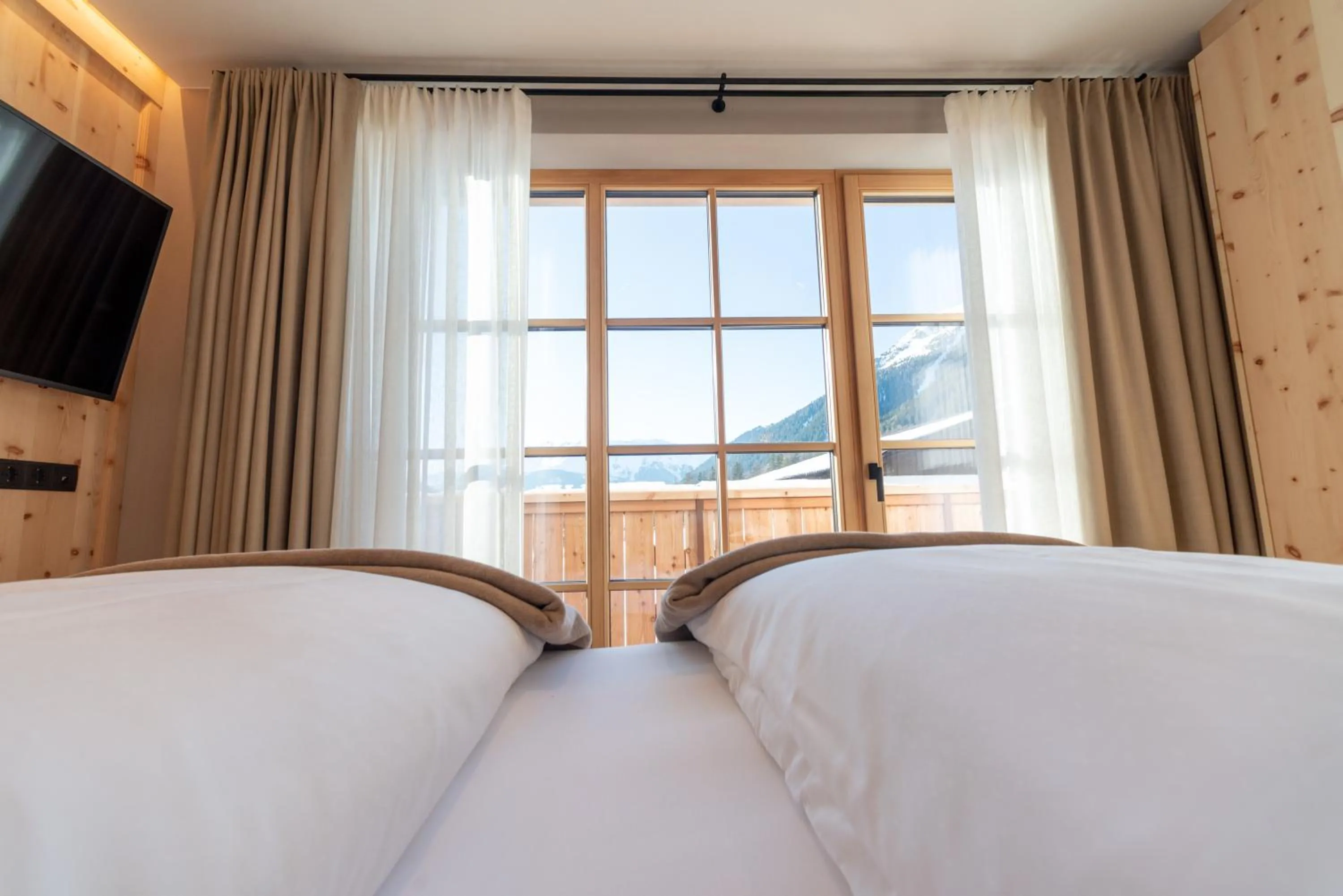 Photo of the whole room, Bed in Penserhof - Alpine Hotel & Restaurant
