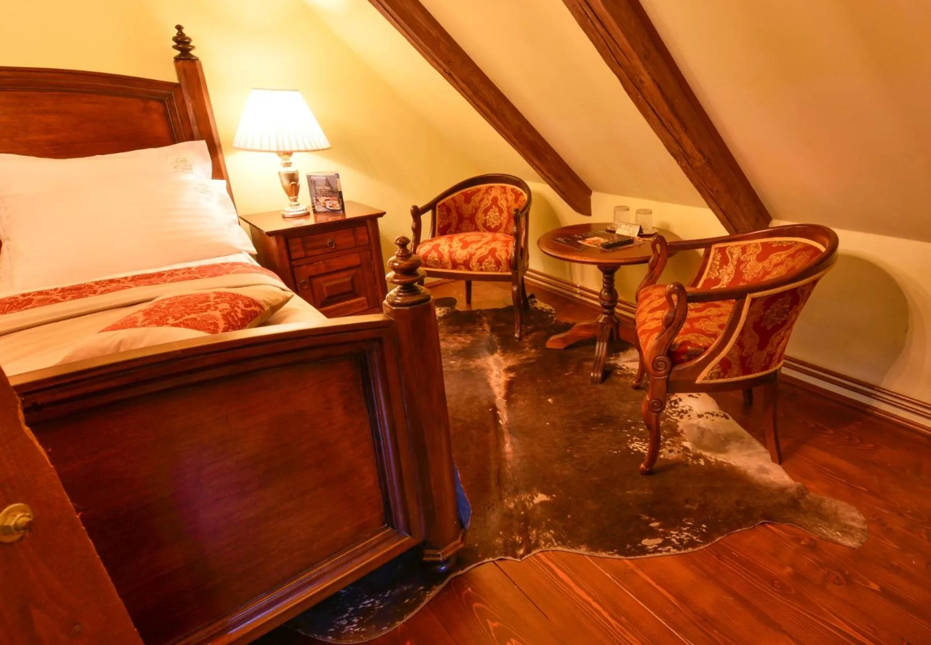 Photo of the whole room, Bed in Casa Georgius Krauss Sighisoara