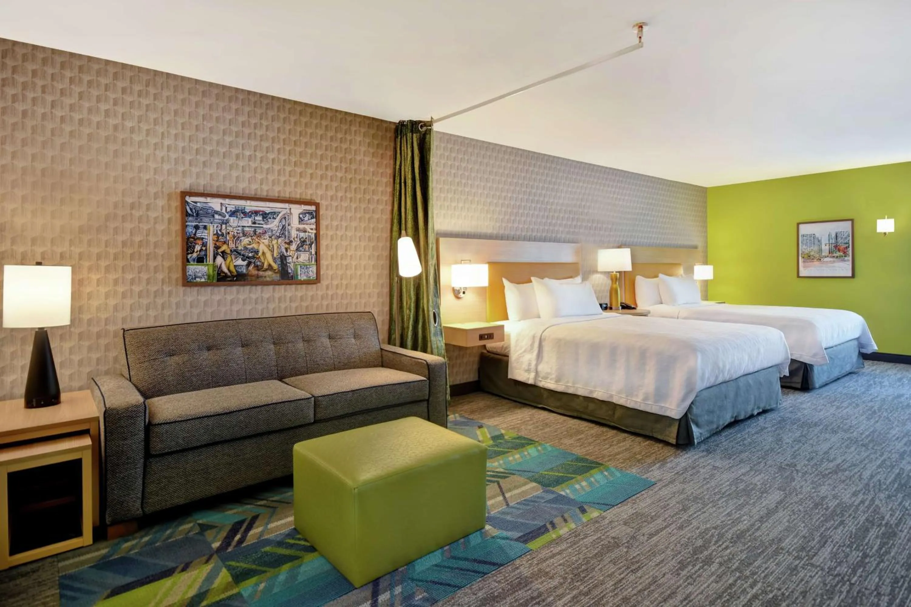 Living room, Bed in Home2 Suites By Hilton Taylor Detroit