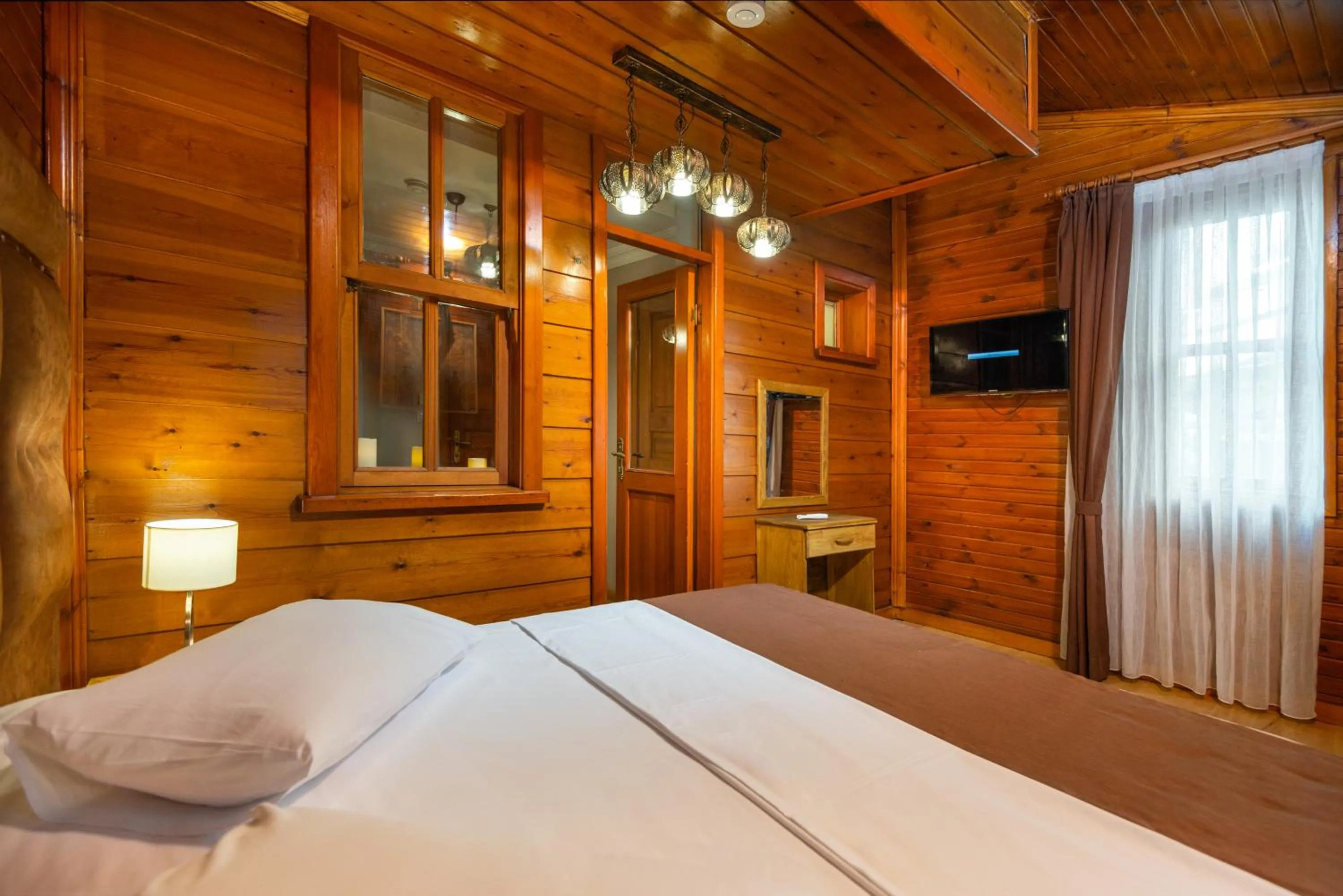 Bed in Wonder Wood Hotel