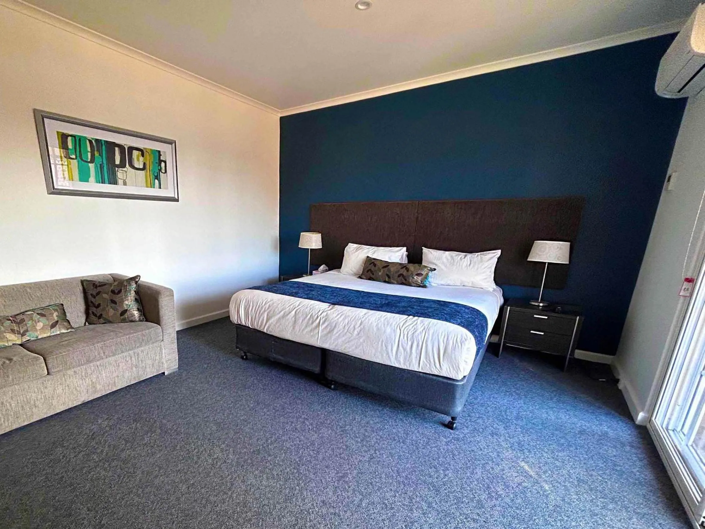 Bed in Golden Age Motor Inn