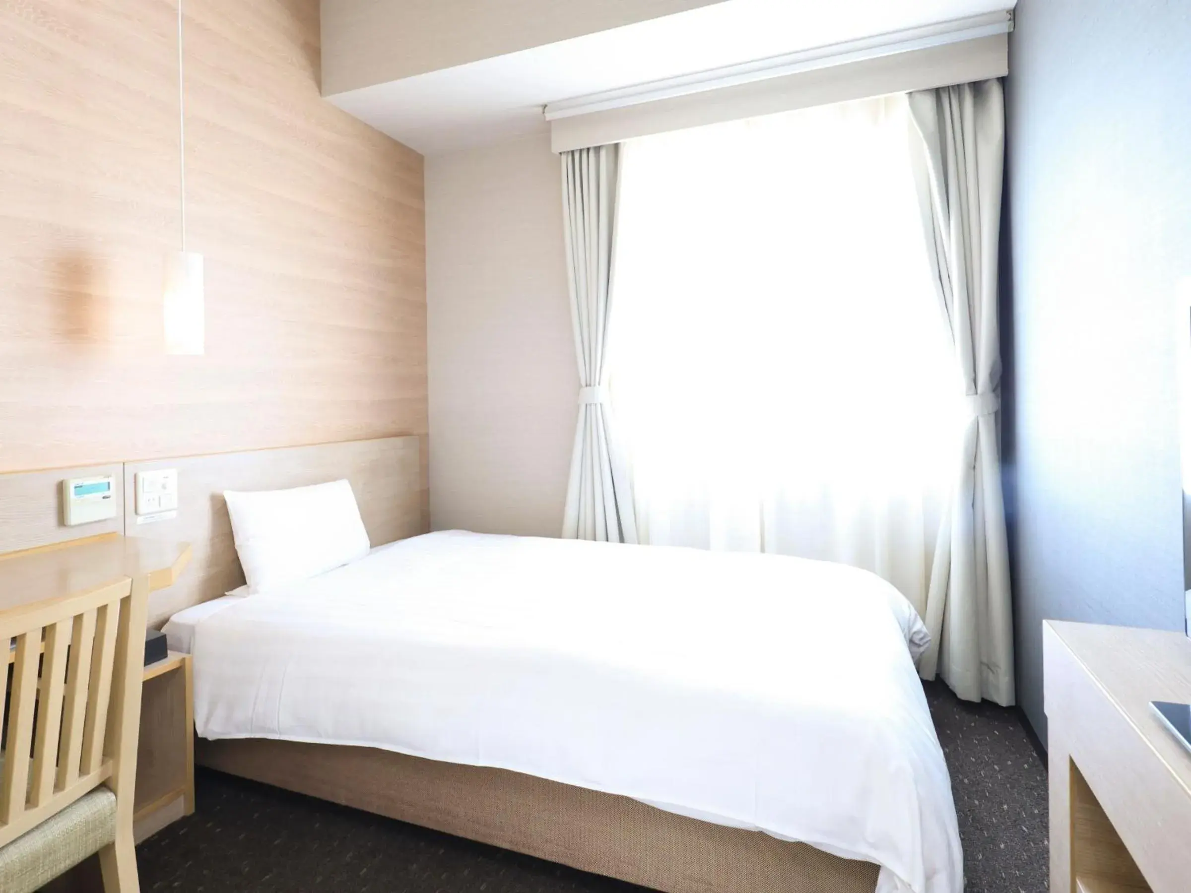 Bed in Dormy Inn Gifu Ekimae Bed in Dormy Inn Gifu Ekimae