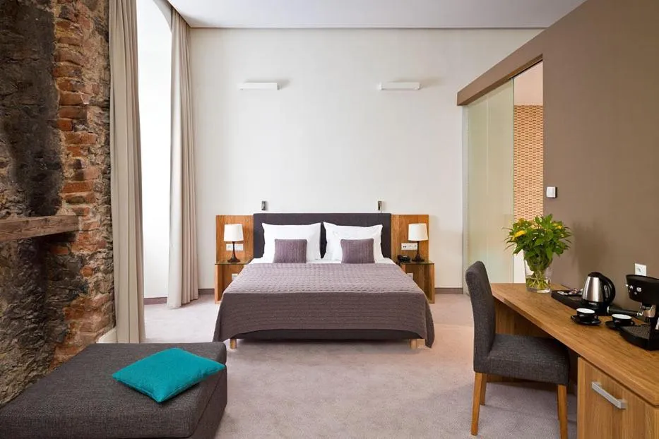 Bed in Uroczysko Siedmiu Stawów & Spa by L'Occitane