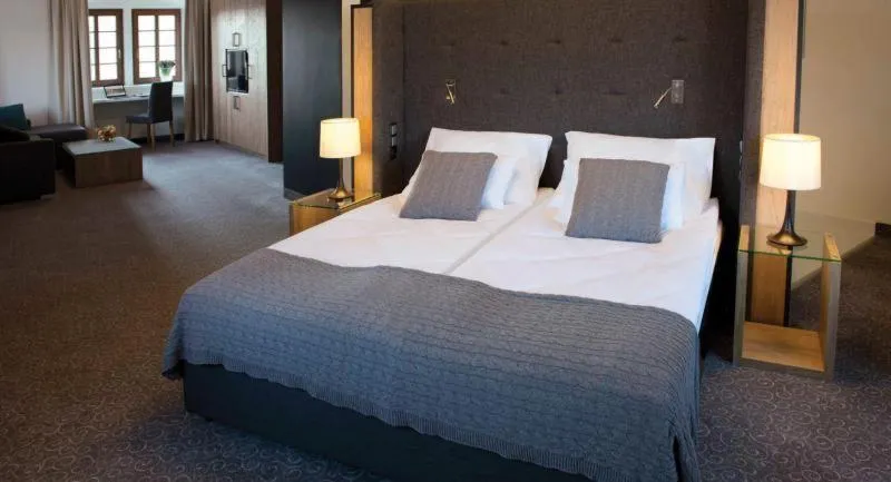 Bed in Uroczysko Siedmiu Stawów & Spa by L'Occitane