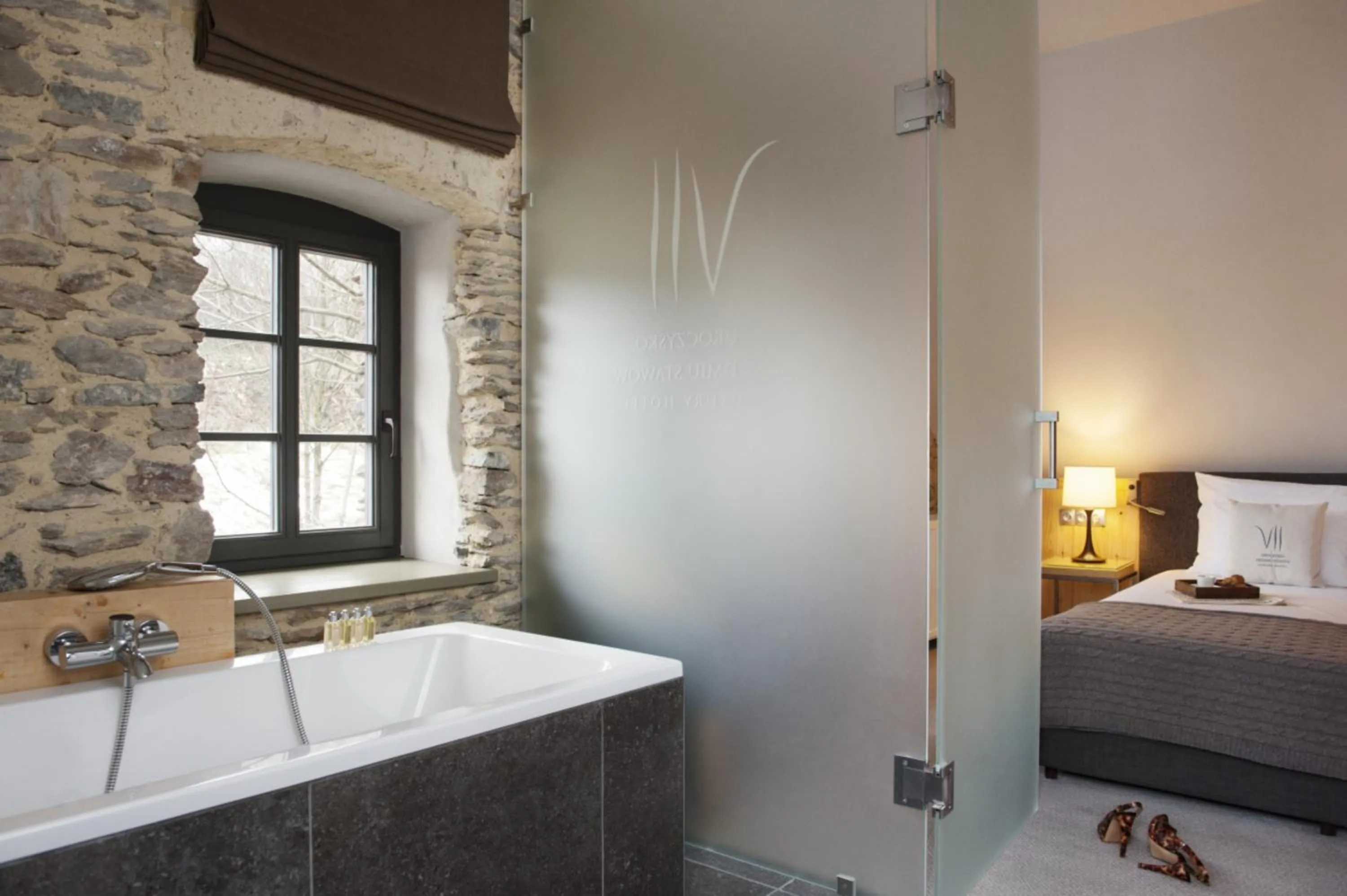 Bed in Uroczysko Siedmiu Stawów & Spa by L'Occitane