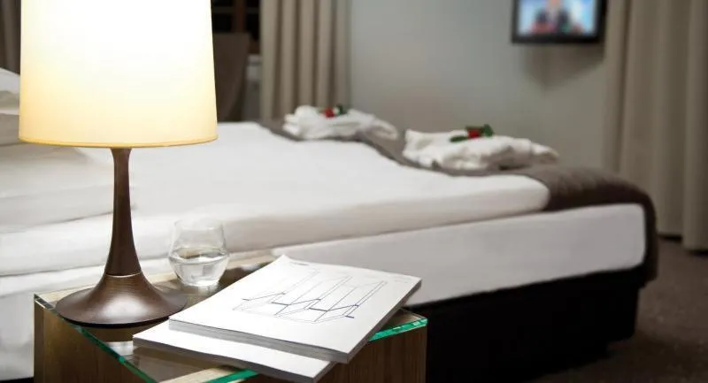 Bed in Uroczysko Siedmiu Stawów & Spa by L'Occitane