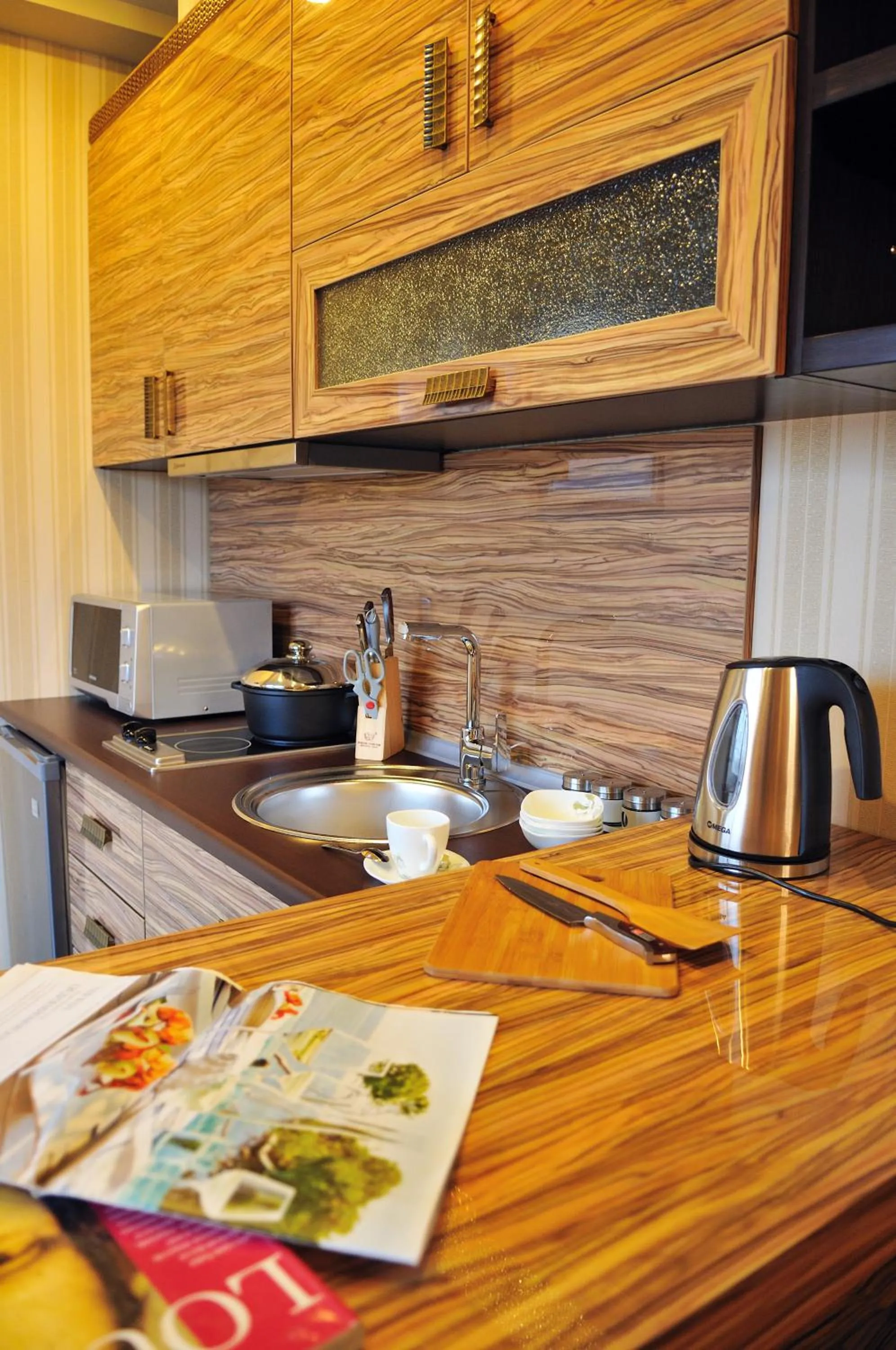 Kitchen or kitchenette in Darhan Boutique Hotel