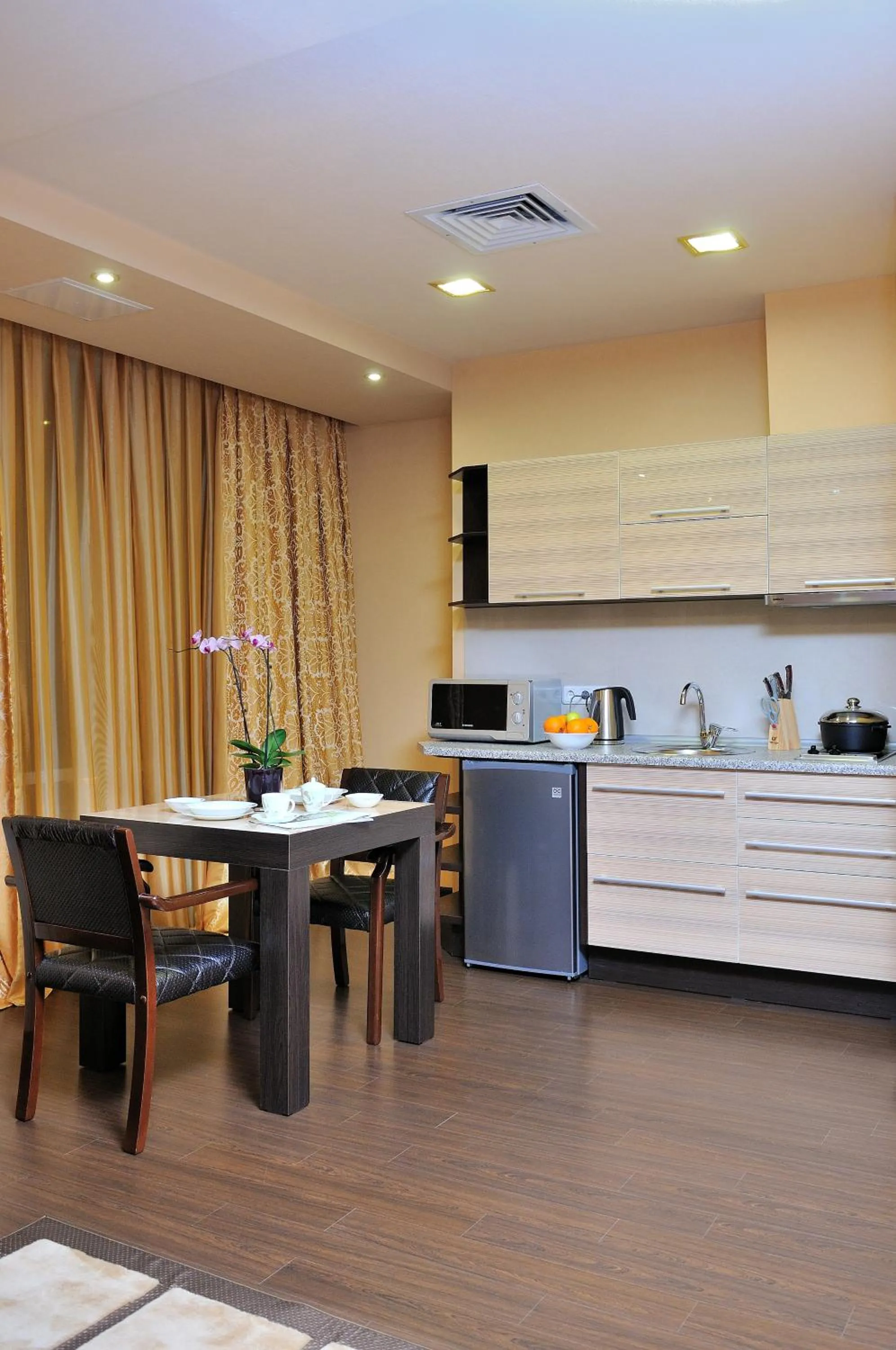 Kitchen or kitchenette in Darhan Boutique Hotel