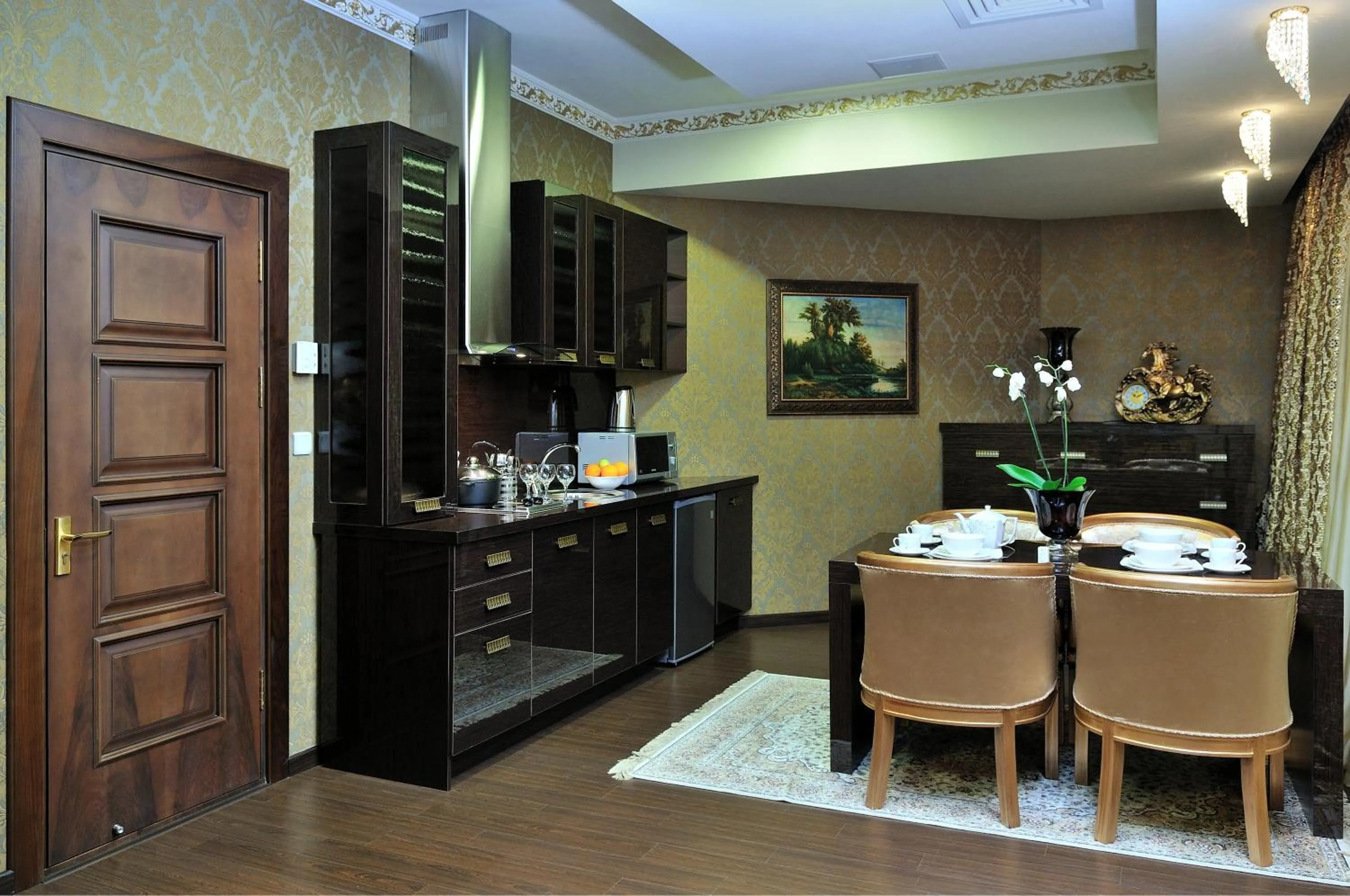 Kitchen or kitchenette in Darhan Boutique Hotel