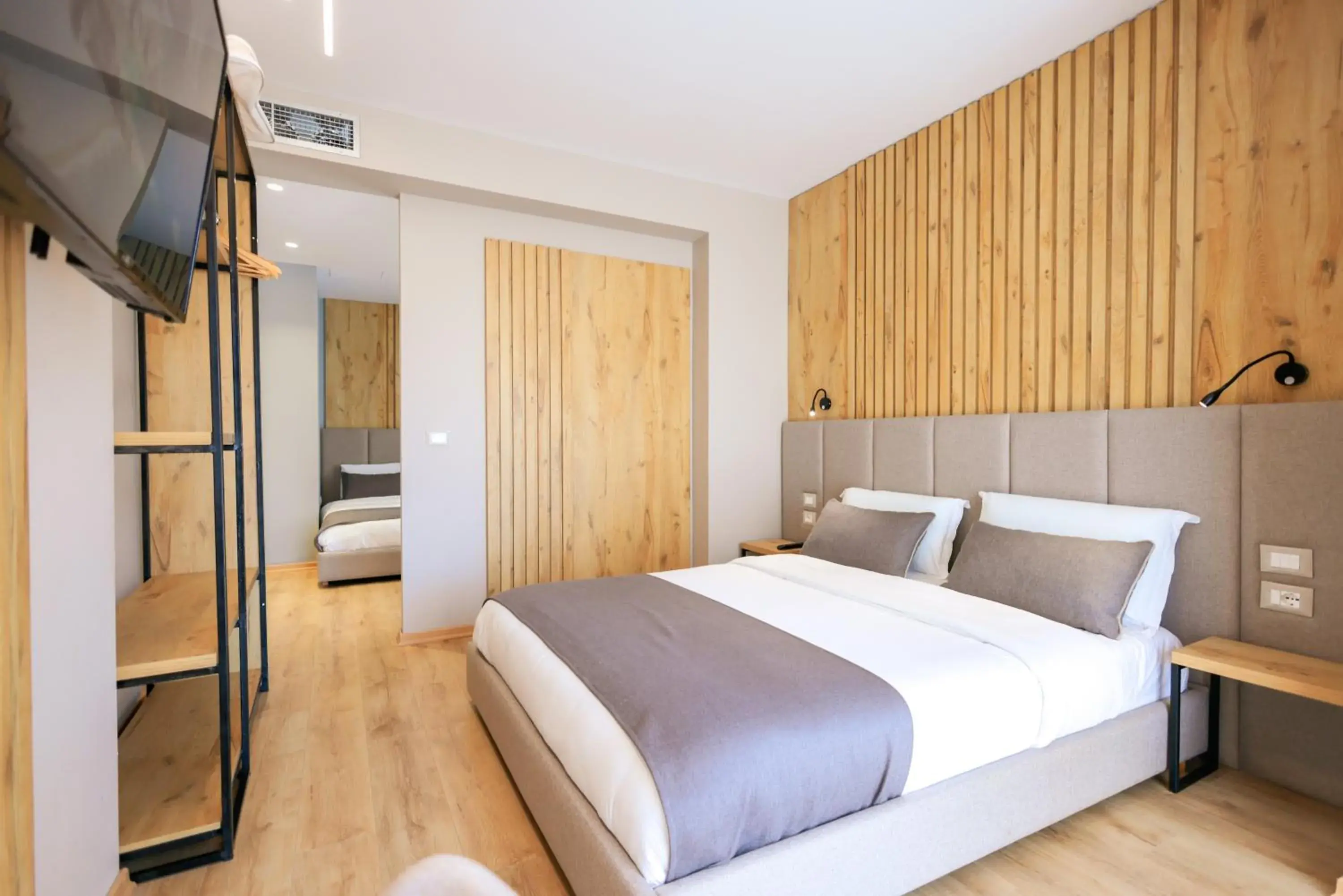 Deluxe Quadruple Room with Balcony and Side Sea View in Hotel Apollon Sarande Deluxe Quadruple Room with Balcony and Side Sea View in Hotel Apollon Sarande