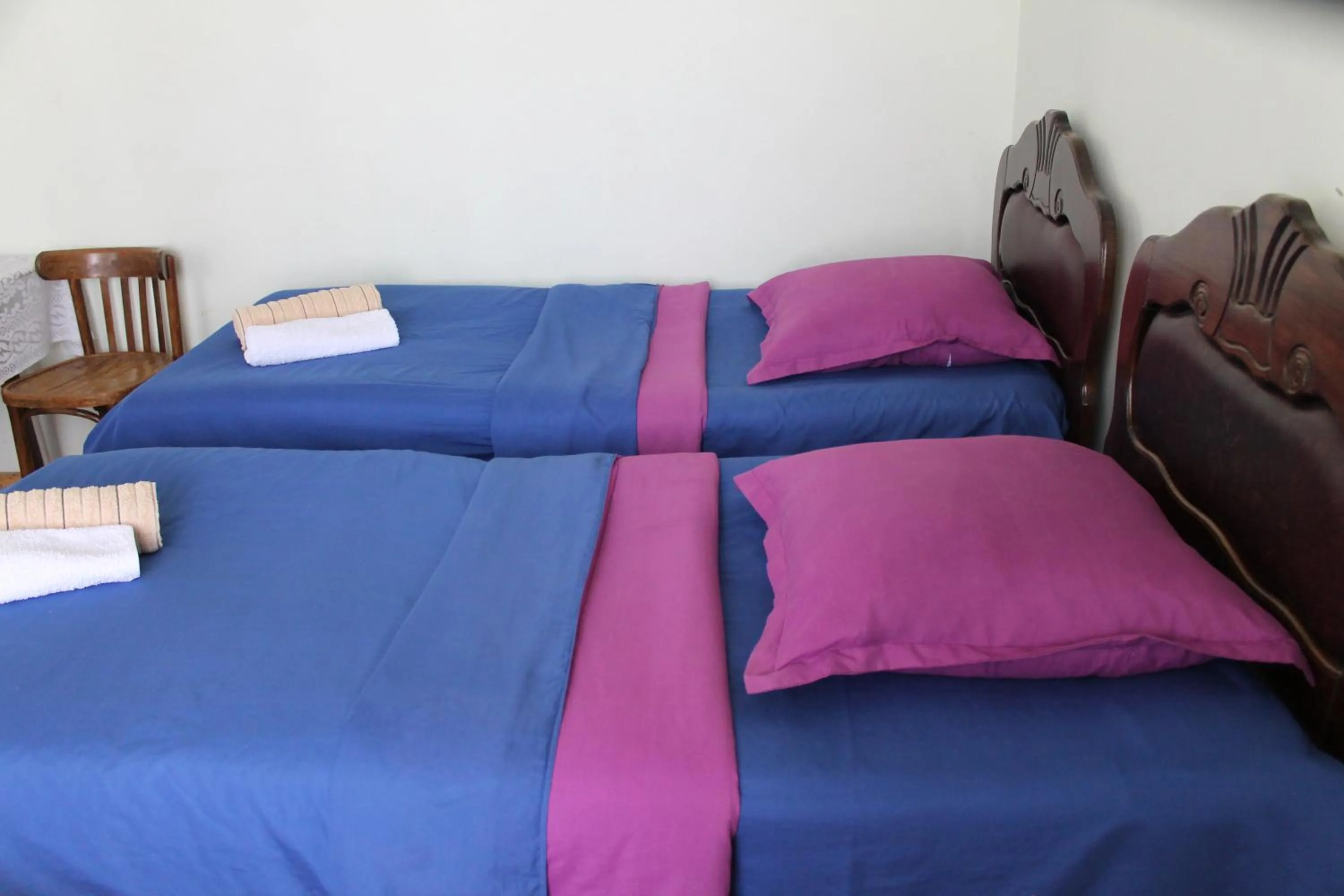 Bed in Maya Guest House