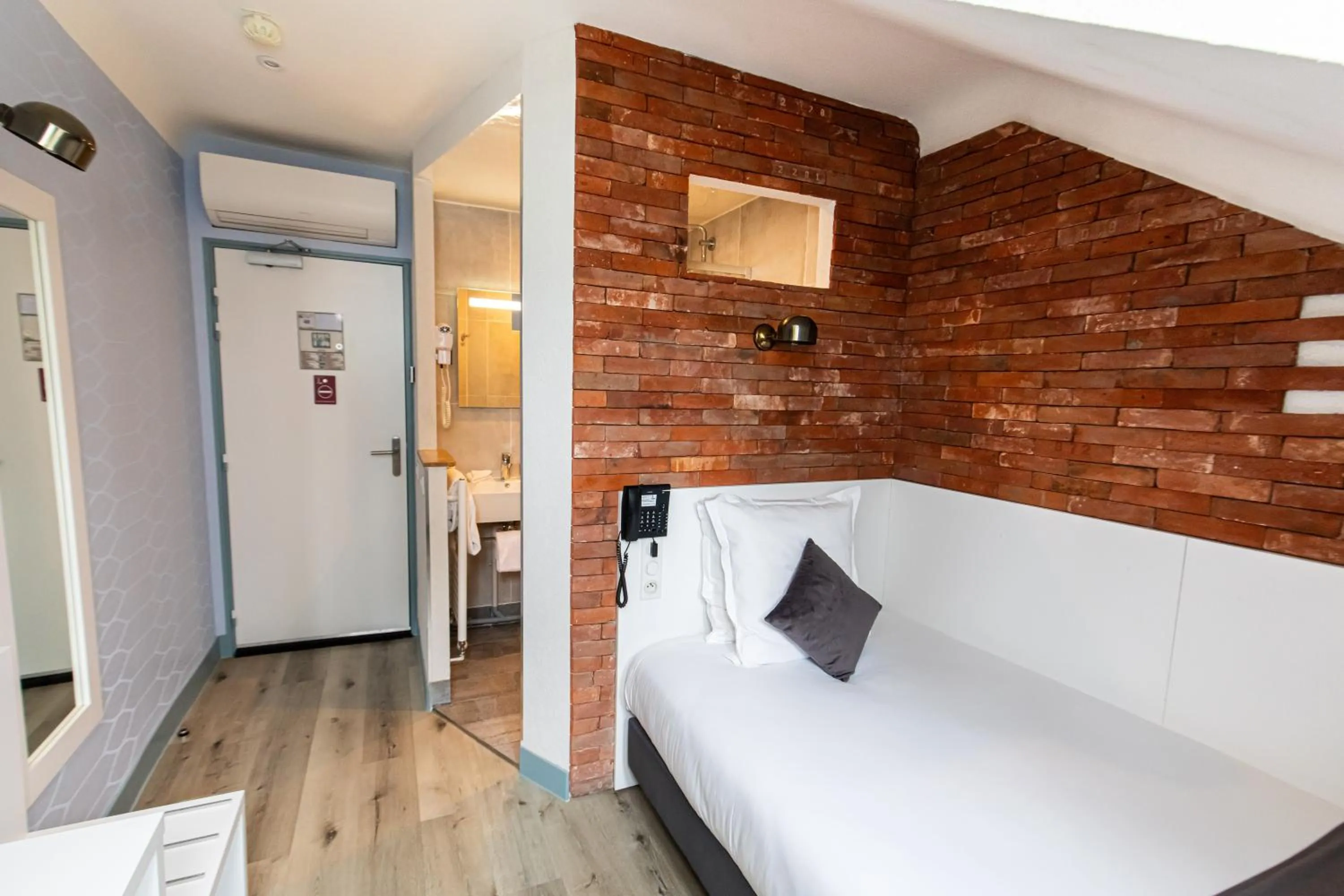 Photo of the whole room, Bed in HOTEL DE PARIS MONTPARNASSE