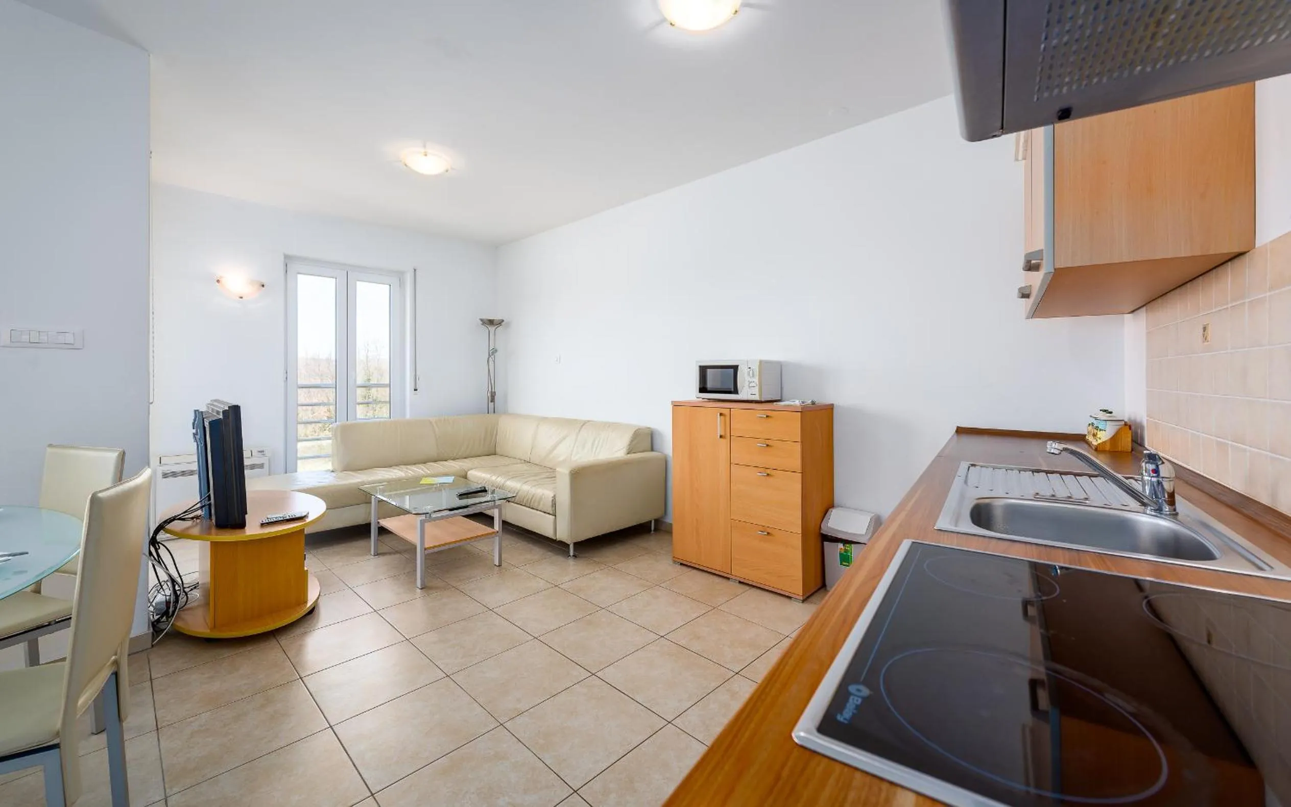 Kitchen or kitchenette in Adria Apartments