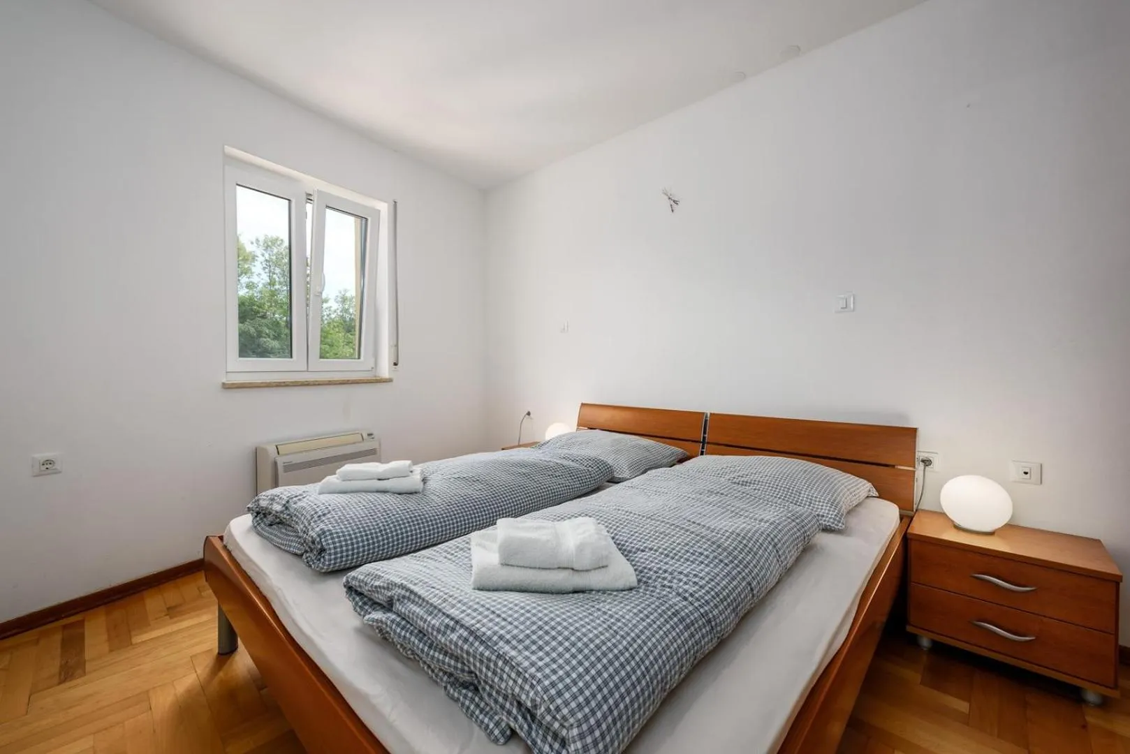 Bed in Adria Apartments