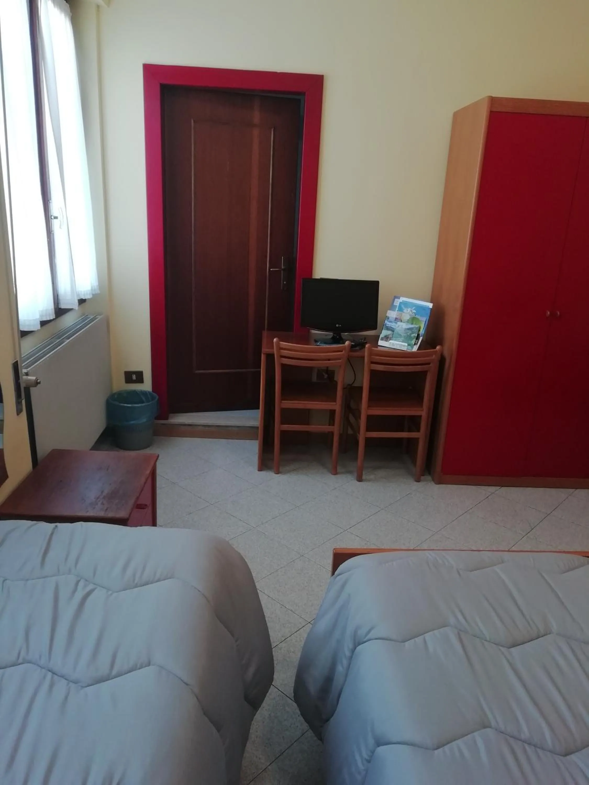 Bed in Hotel Rezia Valtellina