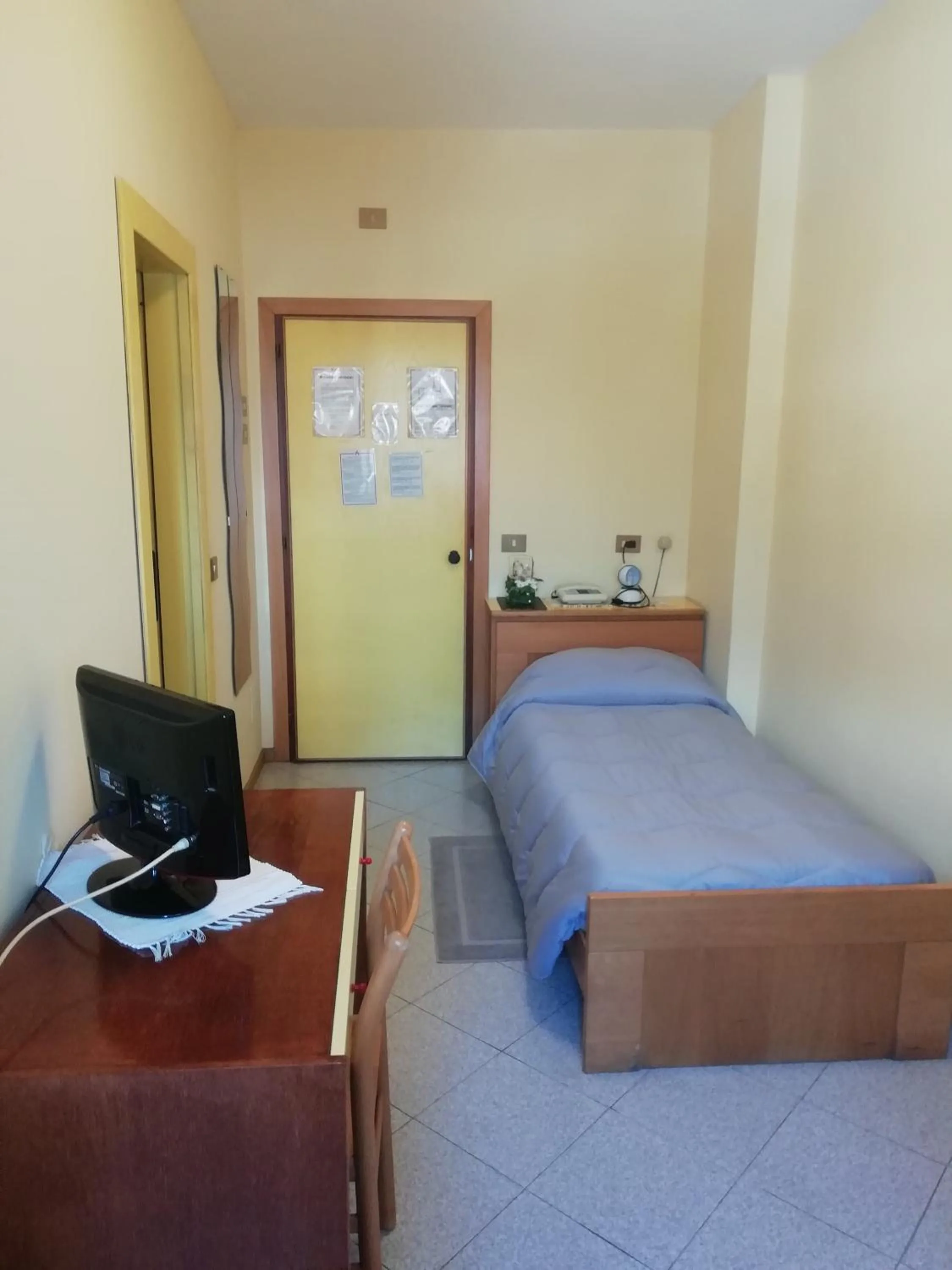 Bed in Hotel Rezia Valtellina
