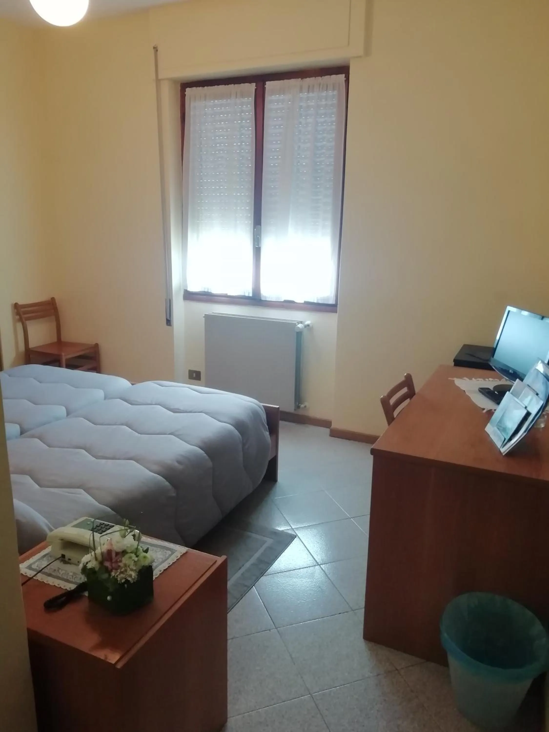 Photo of the whole room, Bed in Hotel Rezia Valtellina