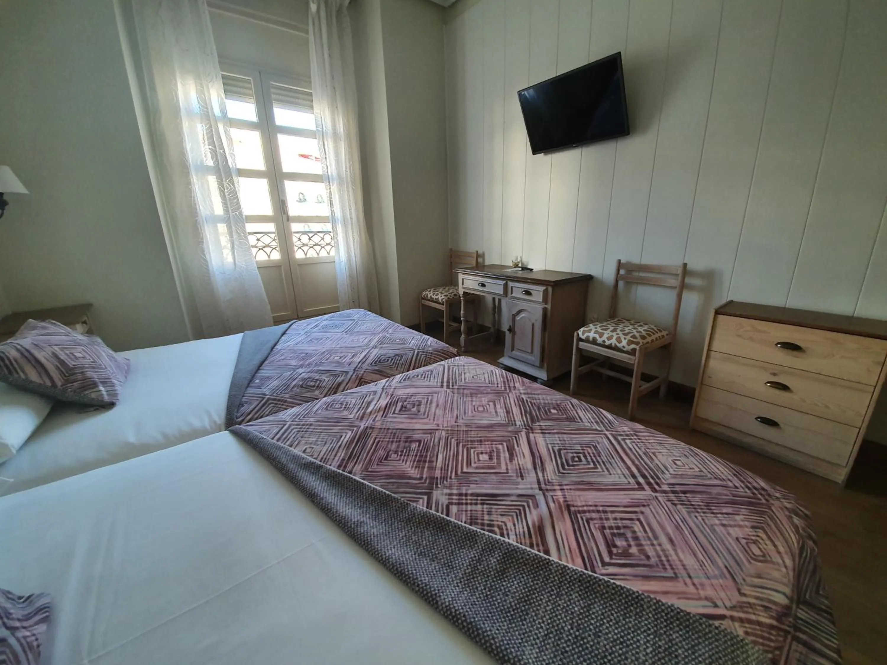 Photo of the whole room, Bed in Hostal Riesco