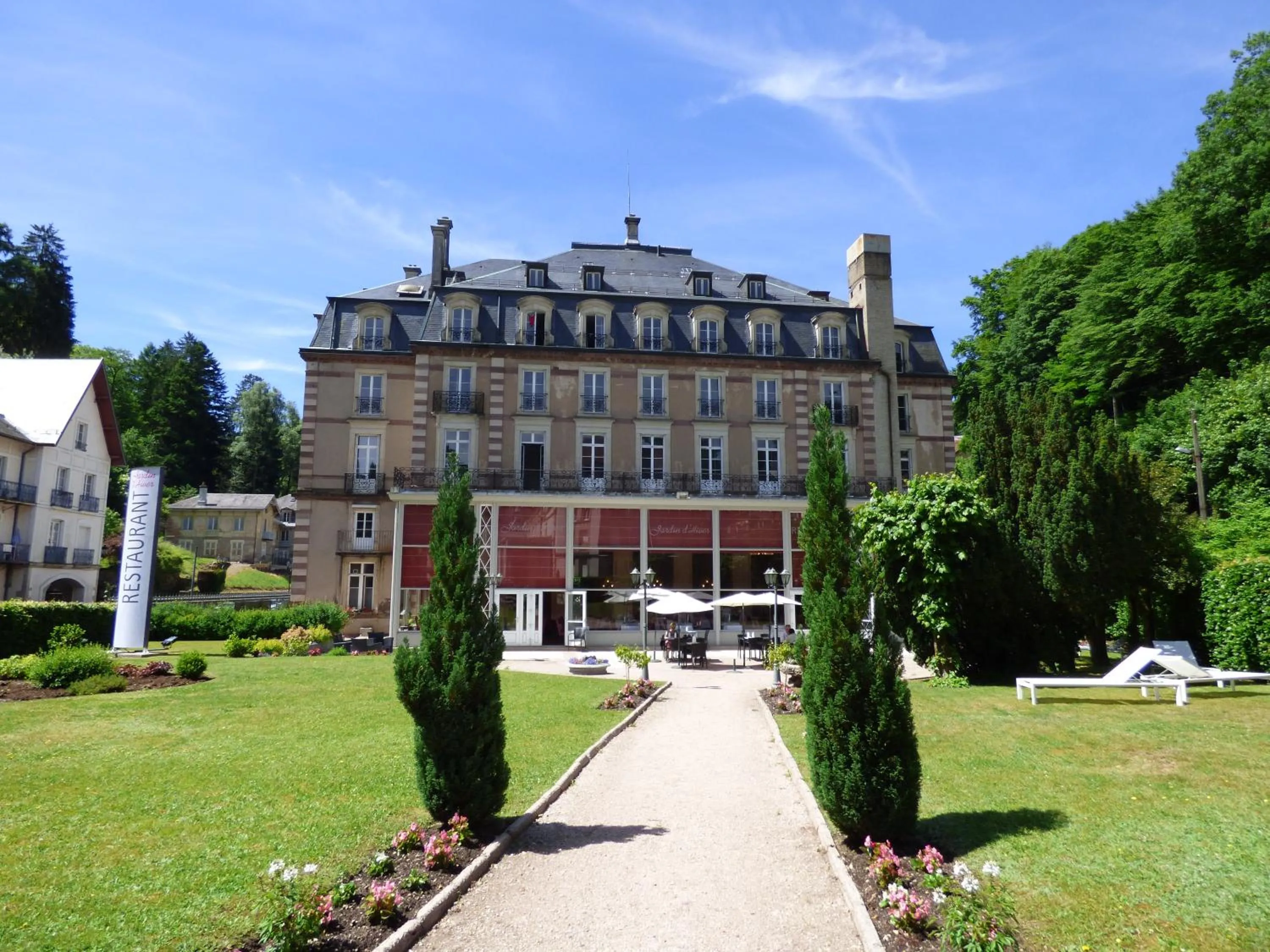 Facade/entrance in Le Grand Hotel de Plombières by Popinns
