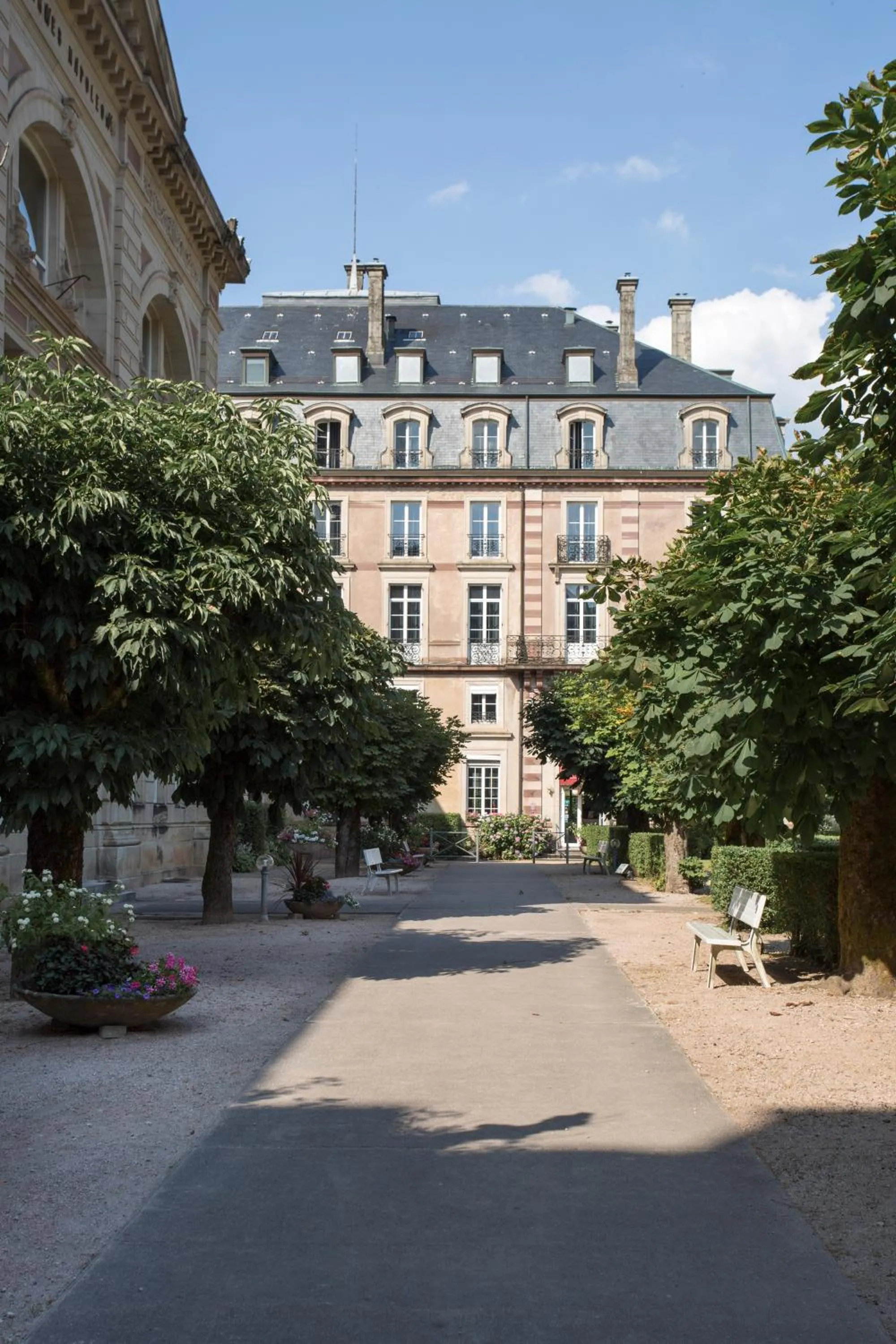 Property building in Le Grand Hotel de Plombières by Popinns