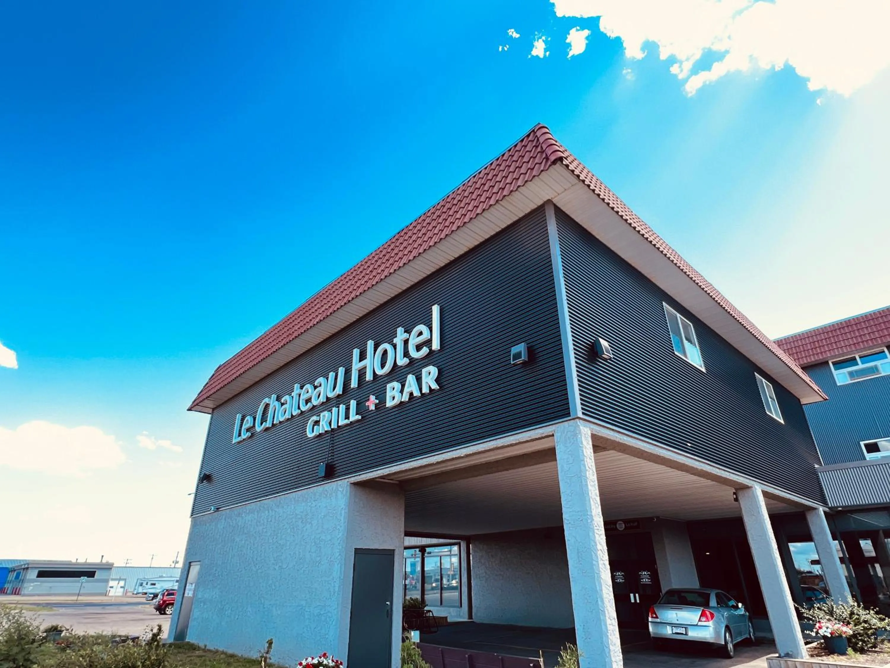 Property building in Camrose Le Chateau Hotel