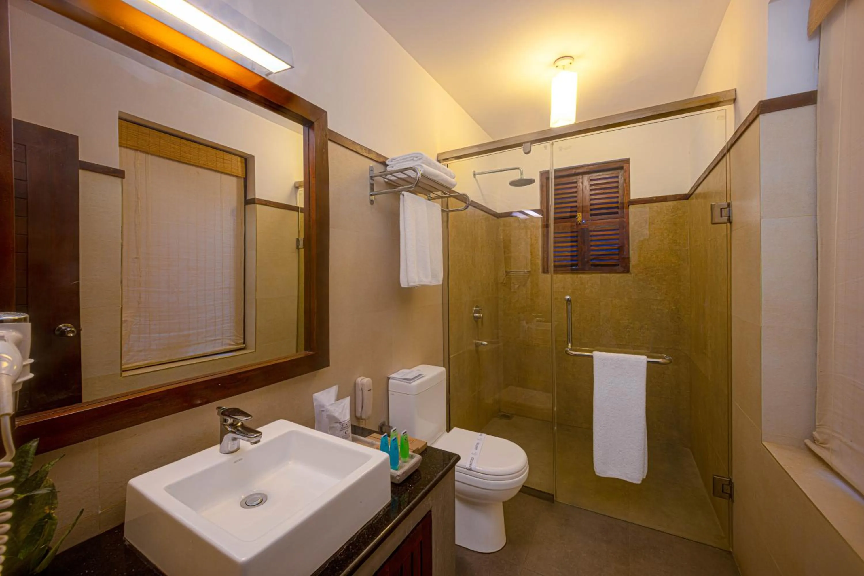 Toilet in Chaarya Resort & Spa
