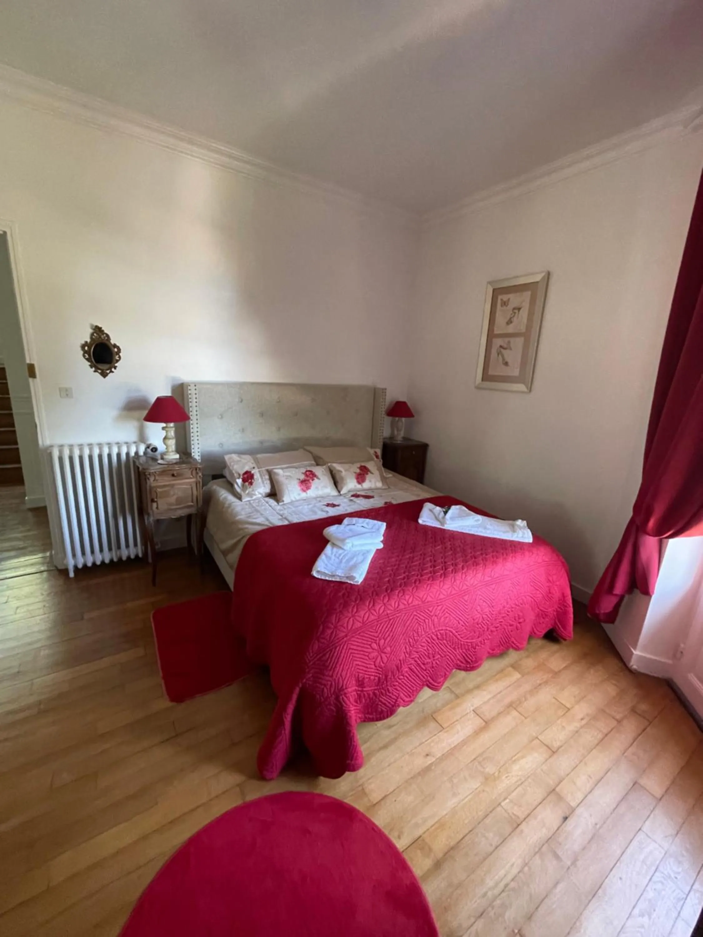 Bed in Vue du Château d'Excideuil en chambres