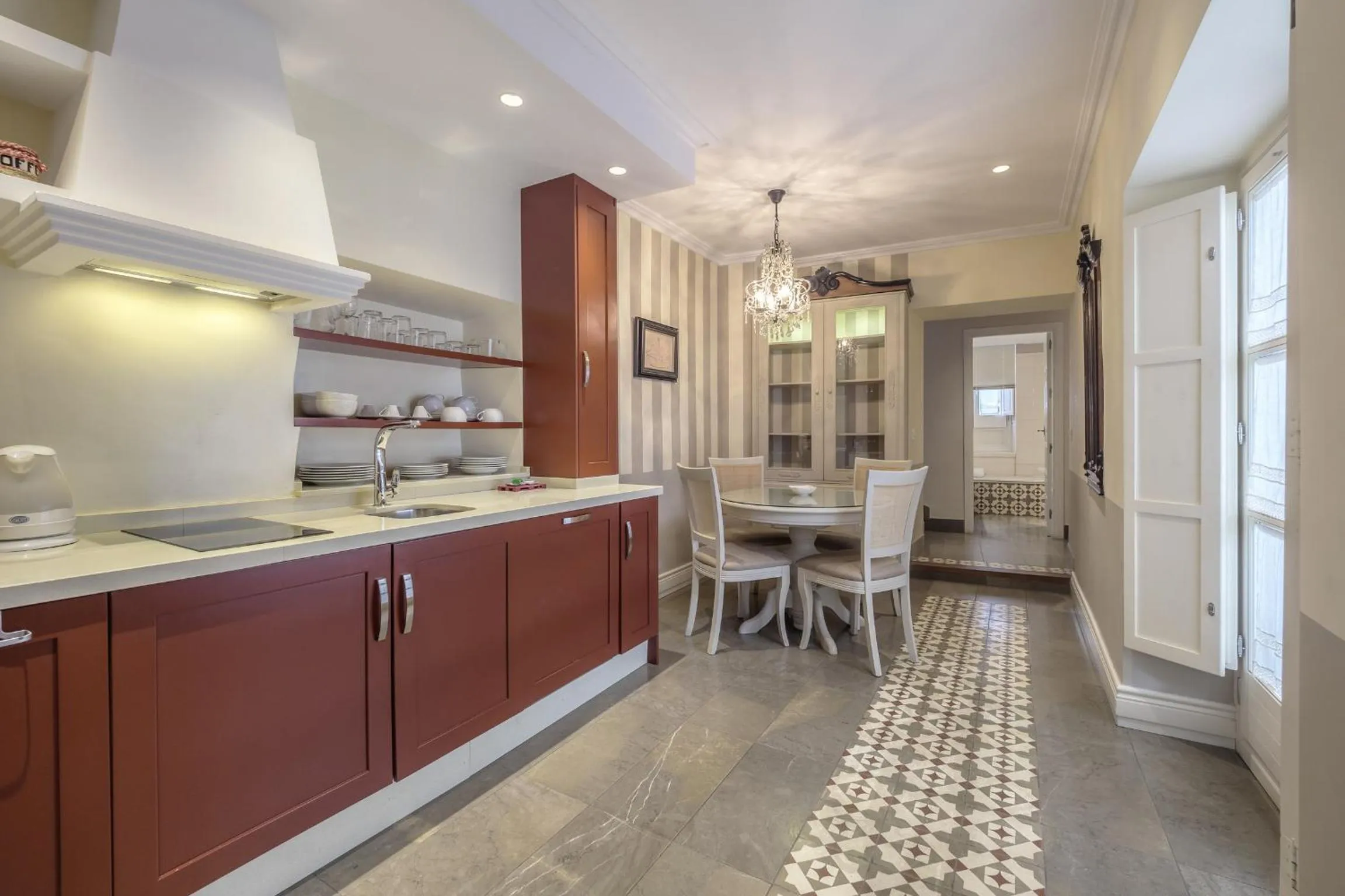 Kitchen or kitchenette in ApartaSuites Alberca Deluxe