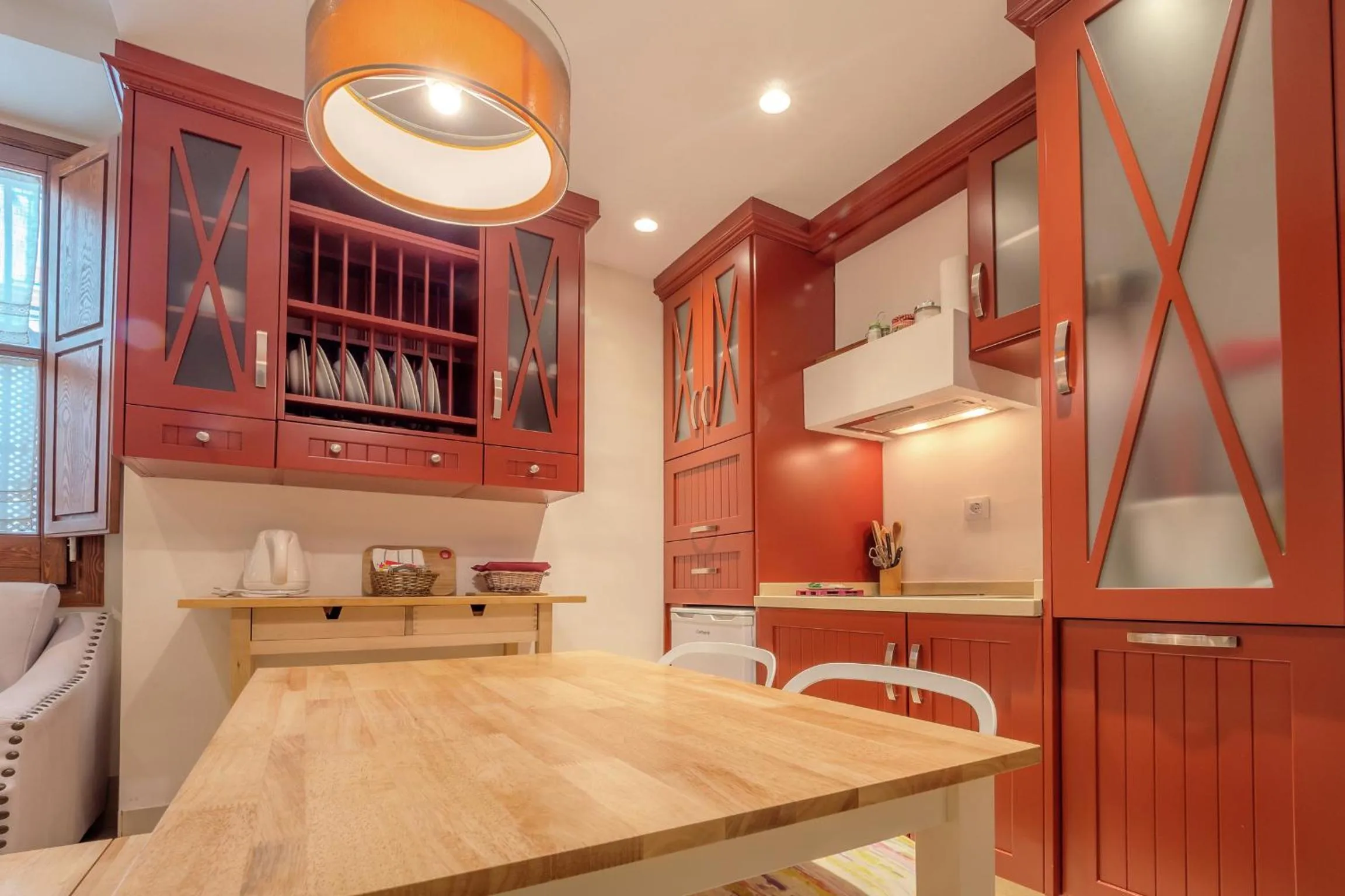 Kitchen or kitchenette in ApartaSuites Alberca Deluxe