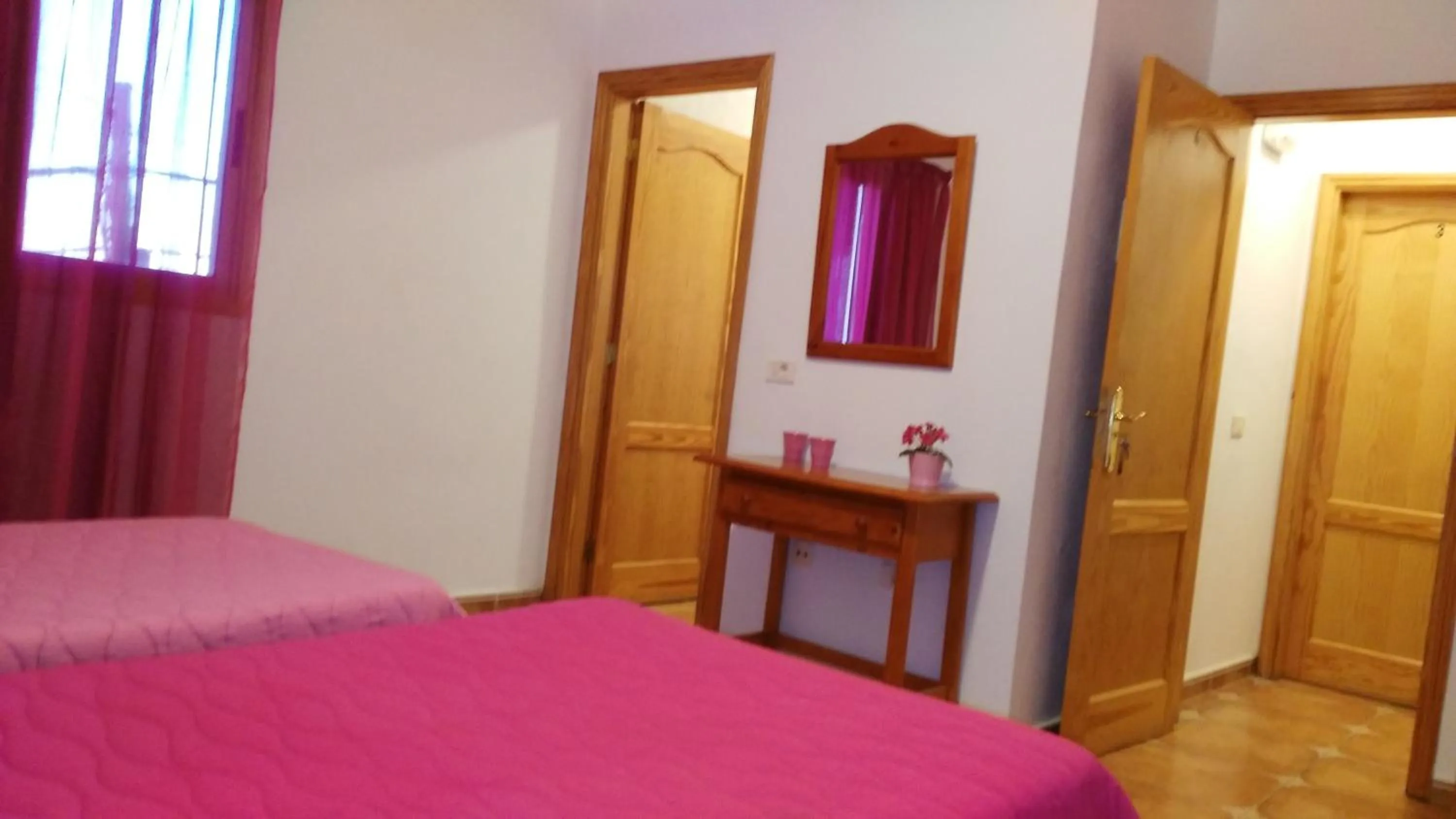 Bed in Pensión Amparo Las Hayas