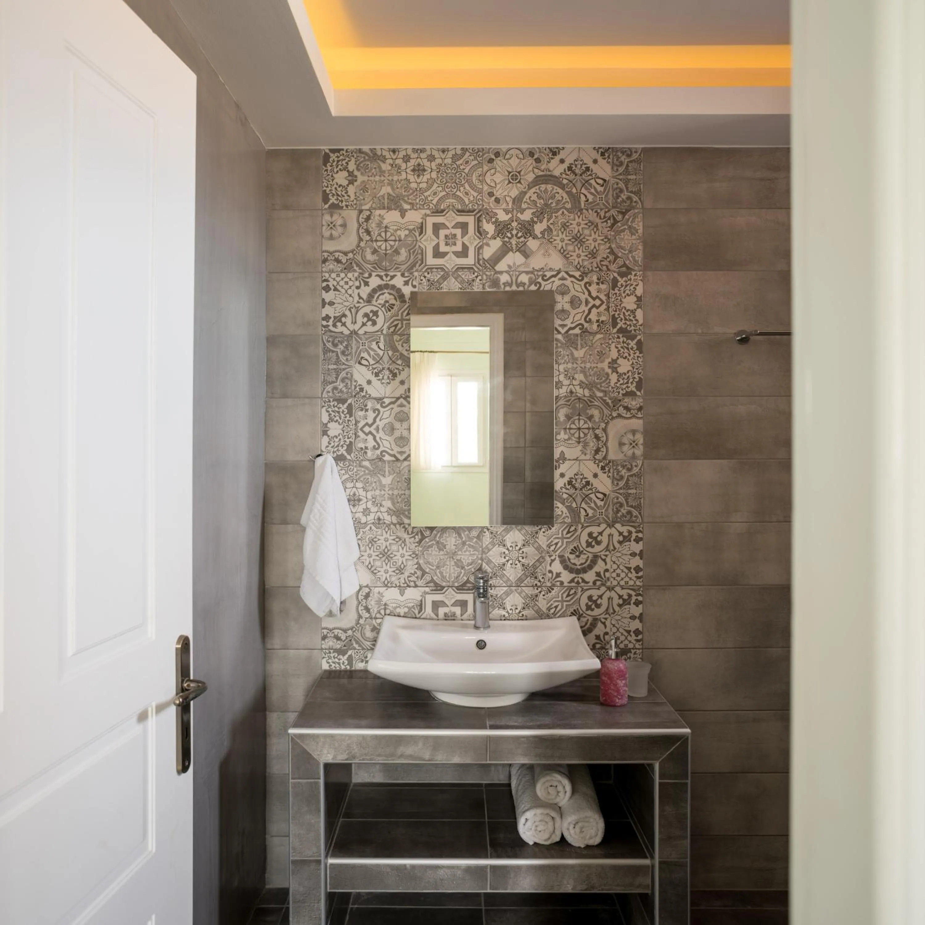 Bathroom in Moonlight Apartments & Suites