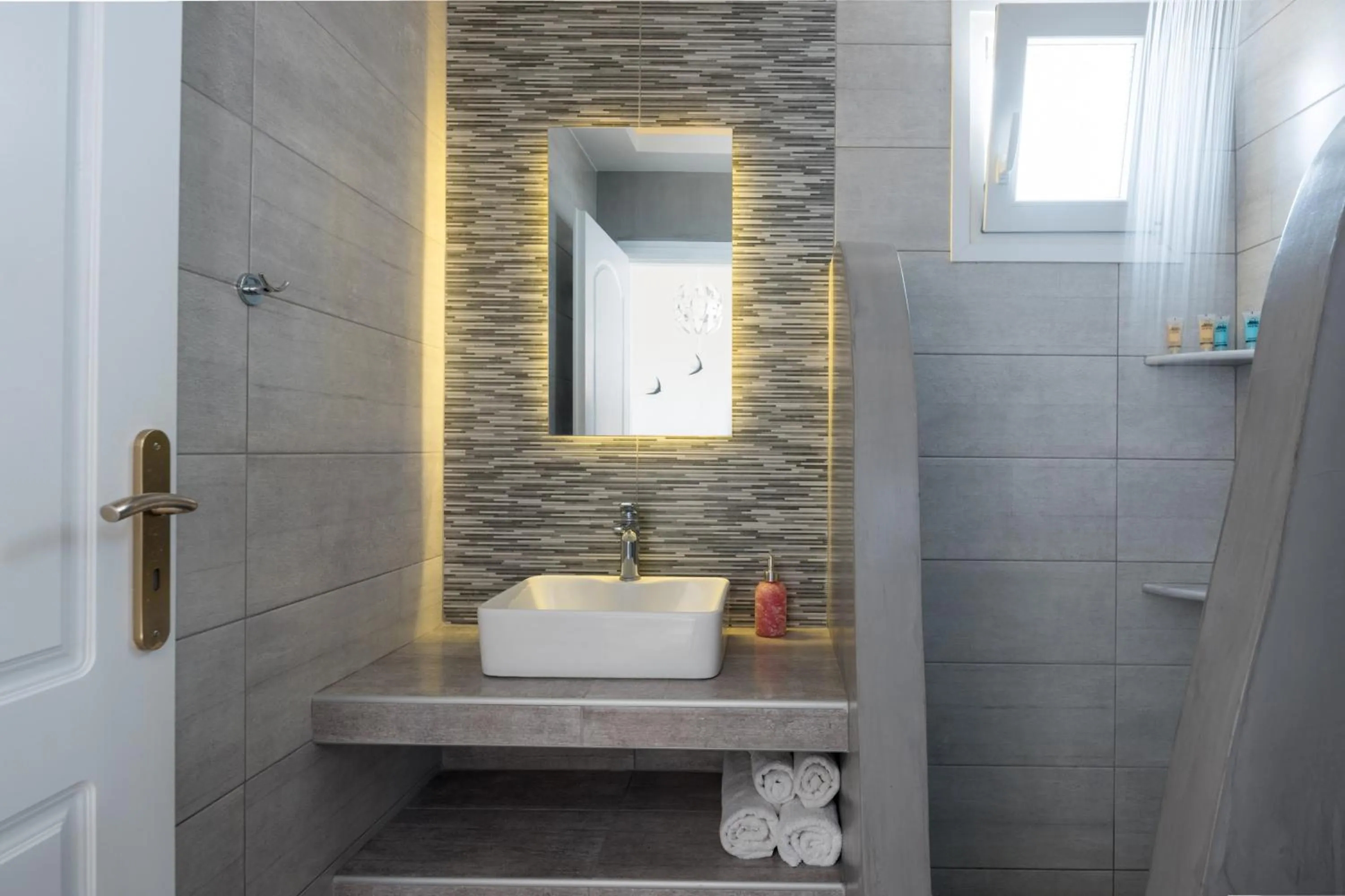 Bathroom in Moonlight Apartments & Suites