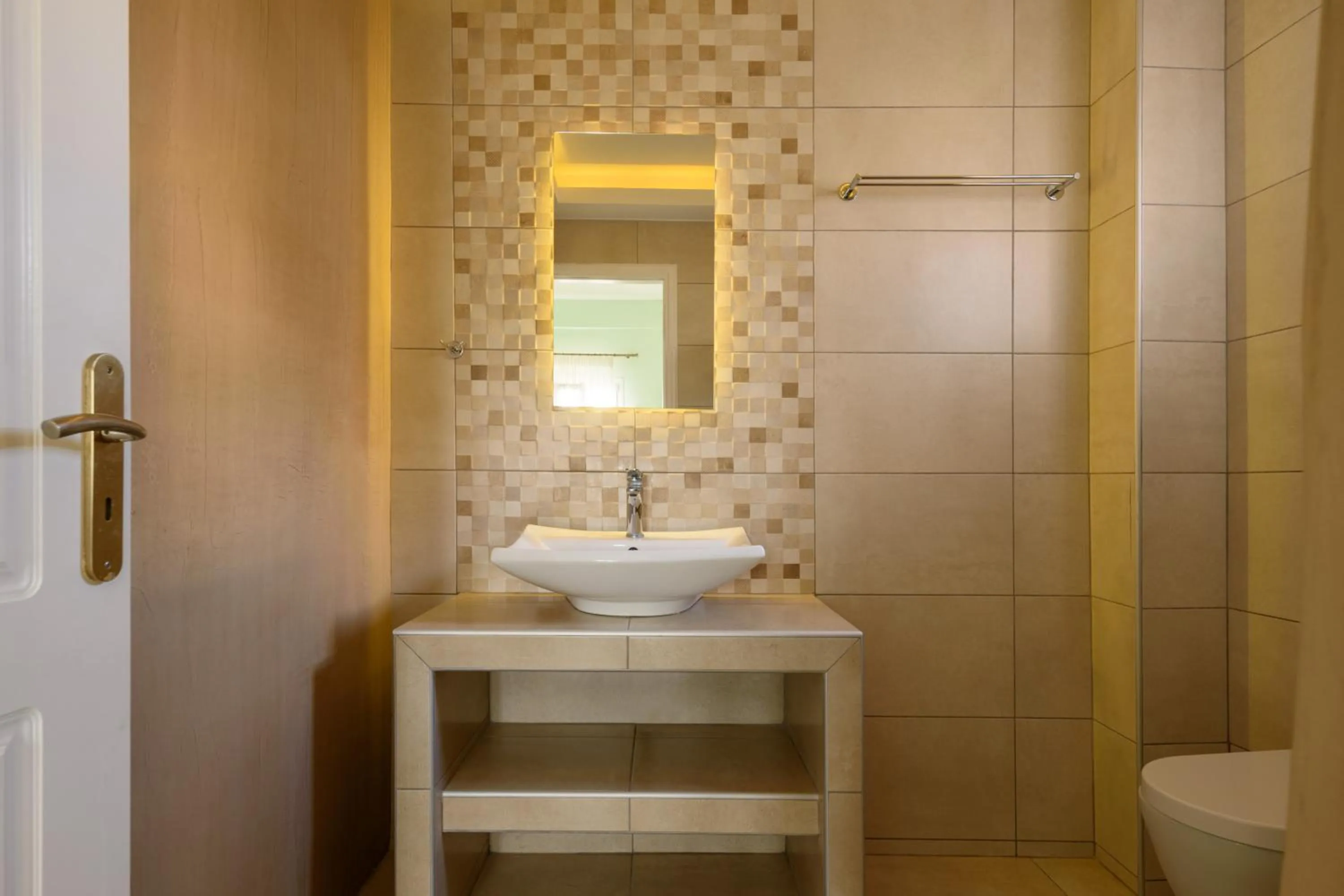 Bathroom in Moonlight Apartments & Suites