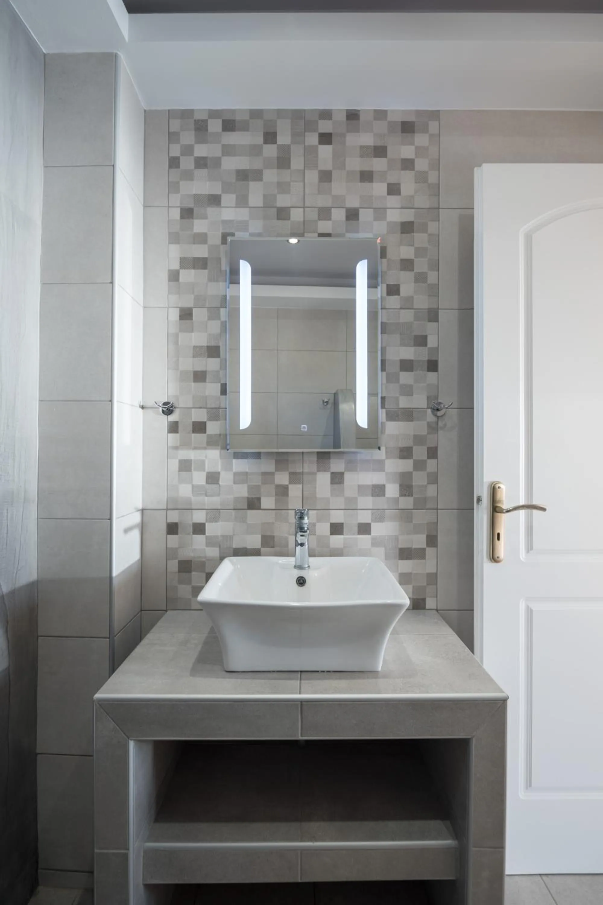 Bathroom in Moonlight Apartments & Suites