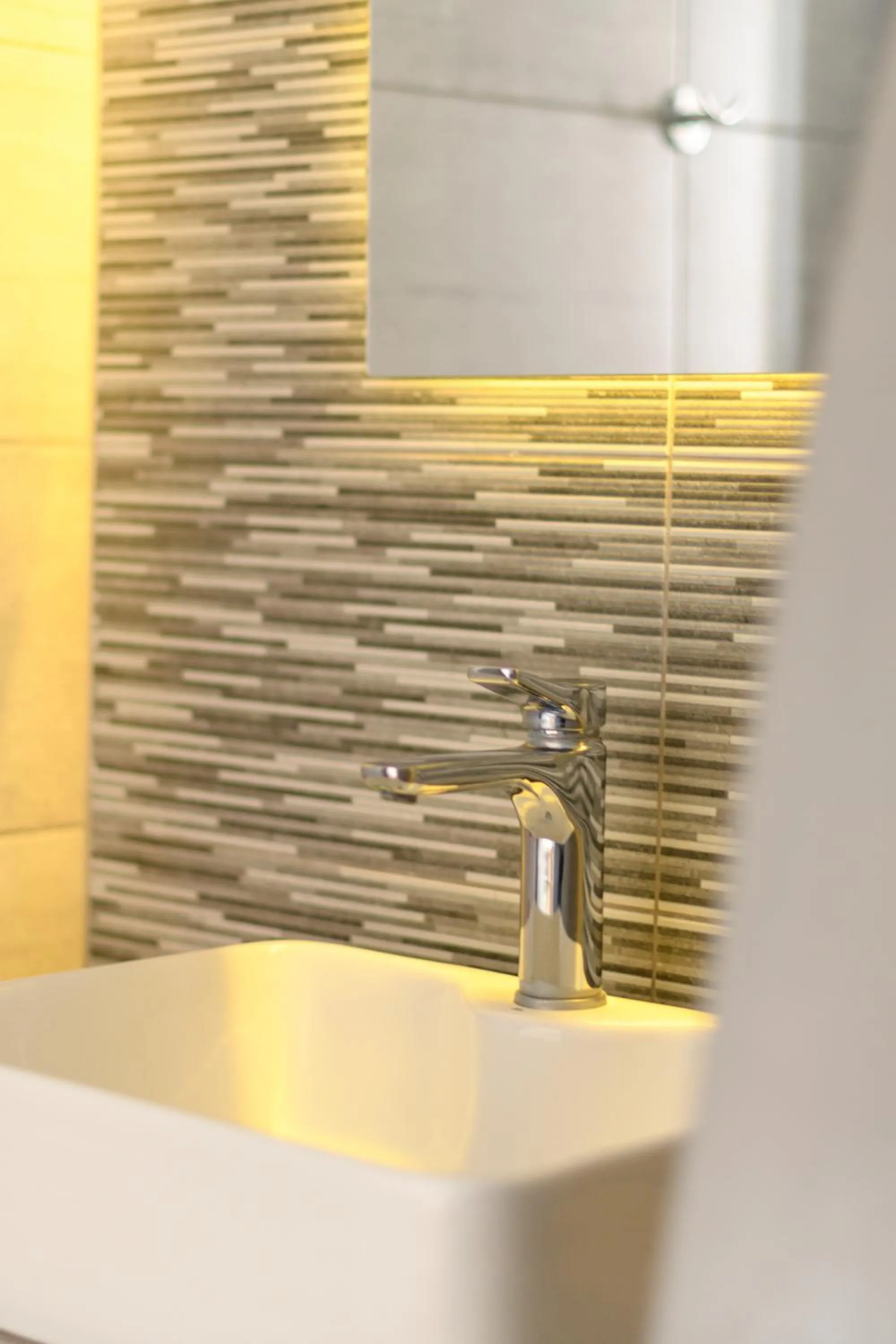 Bathroom in Moonlight Apartments & Suites