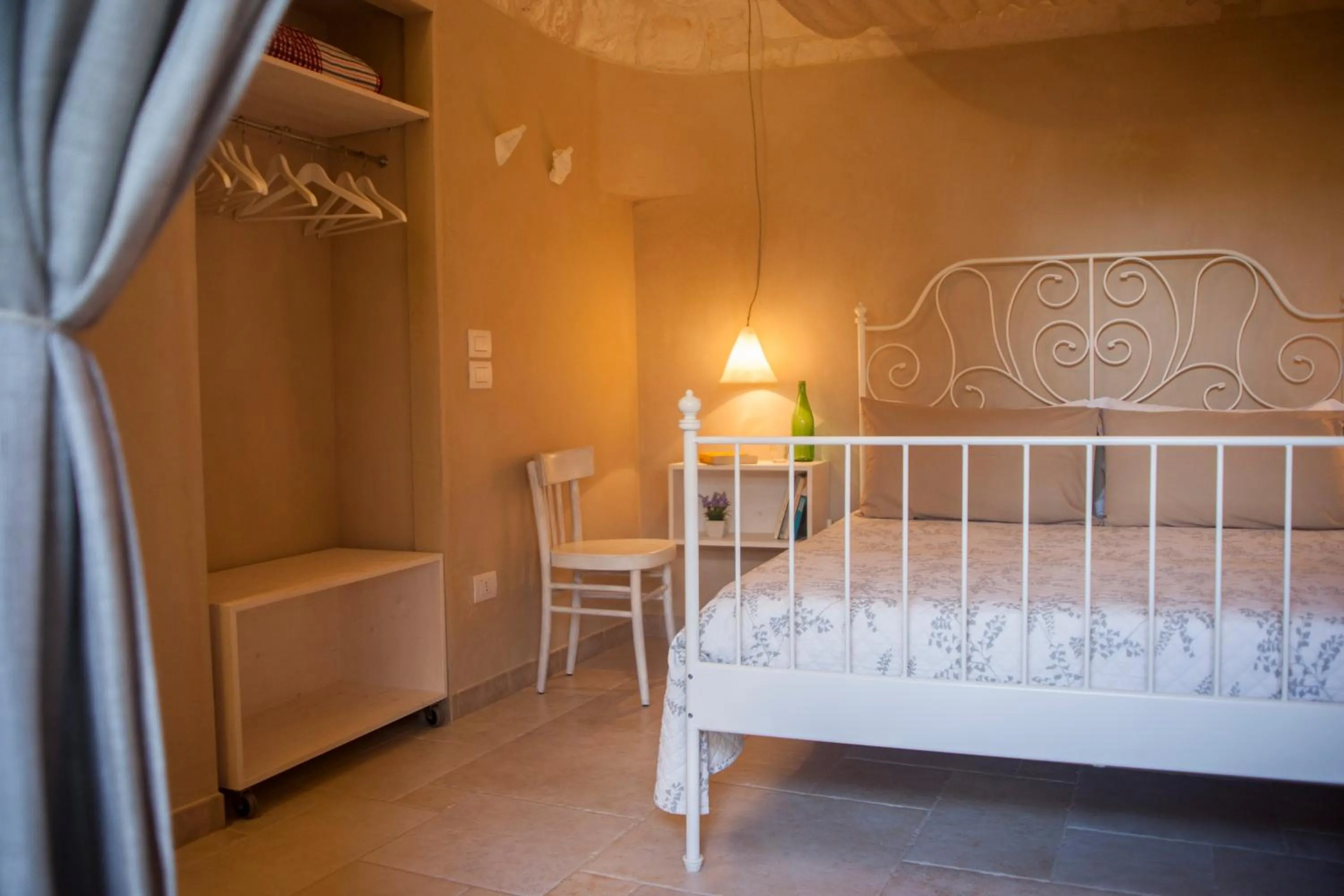 Bed in Il Calàscione Apulian Villas