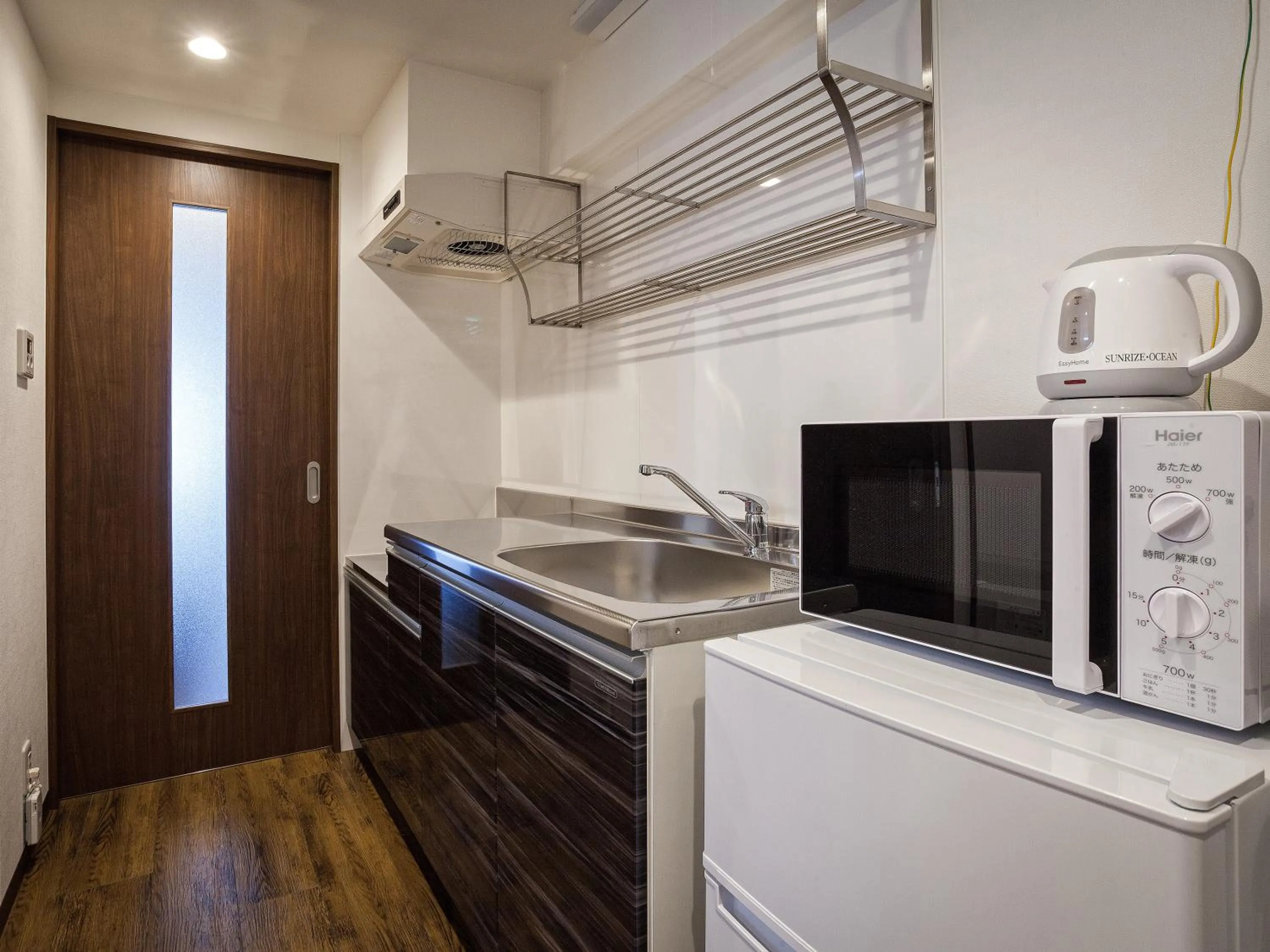 Kitchen or kitchenette in Yonabaru Hotel SUNRIZE OCEAN