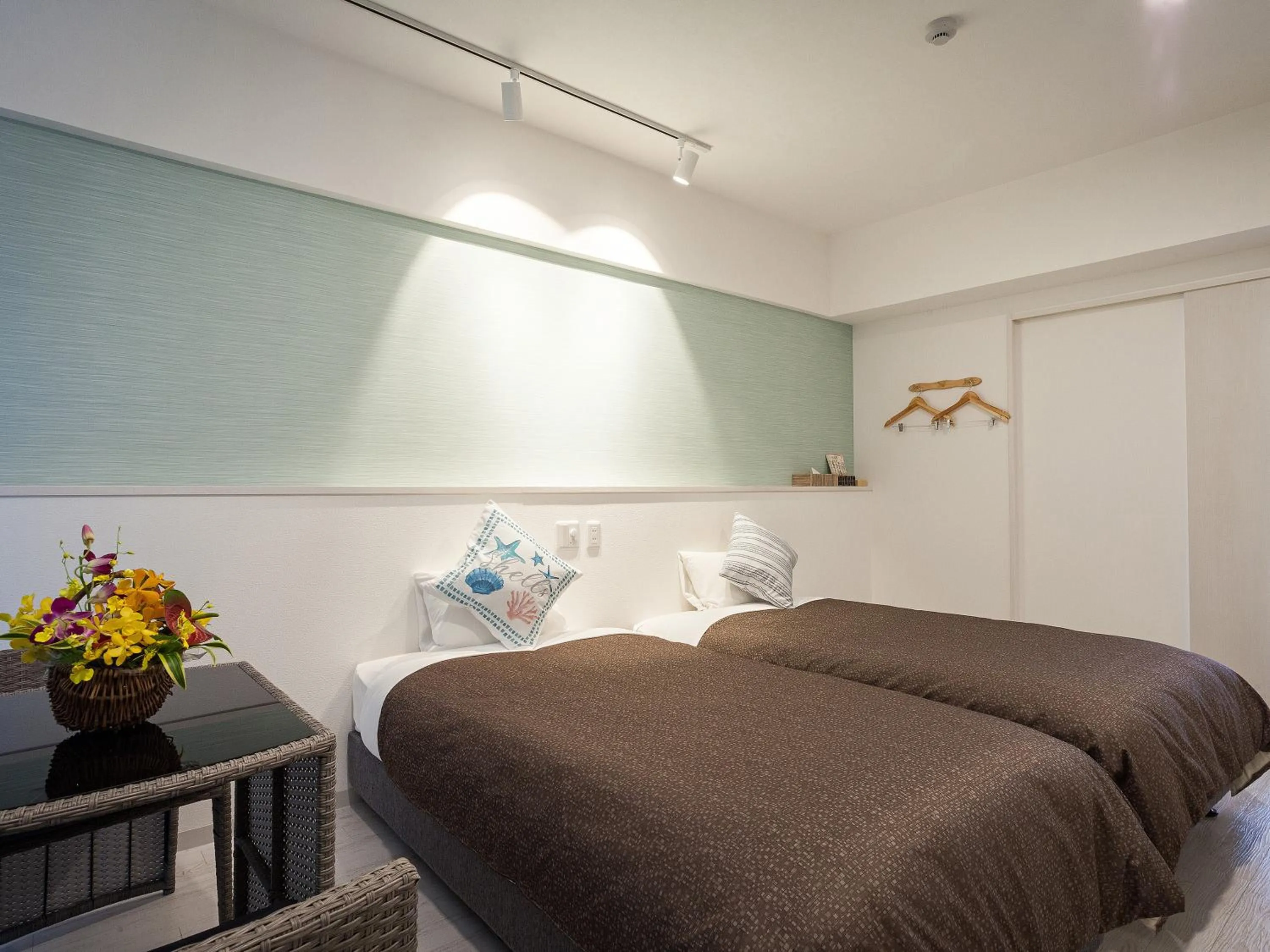 Bedroom, Bed in Yonabaru Hotel SUNRIZE OCEAN