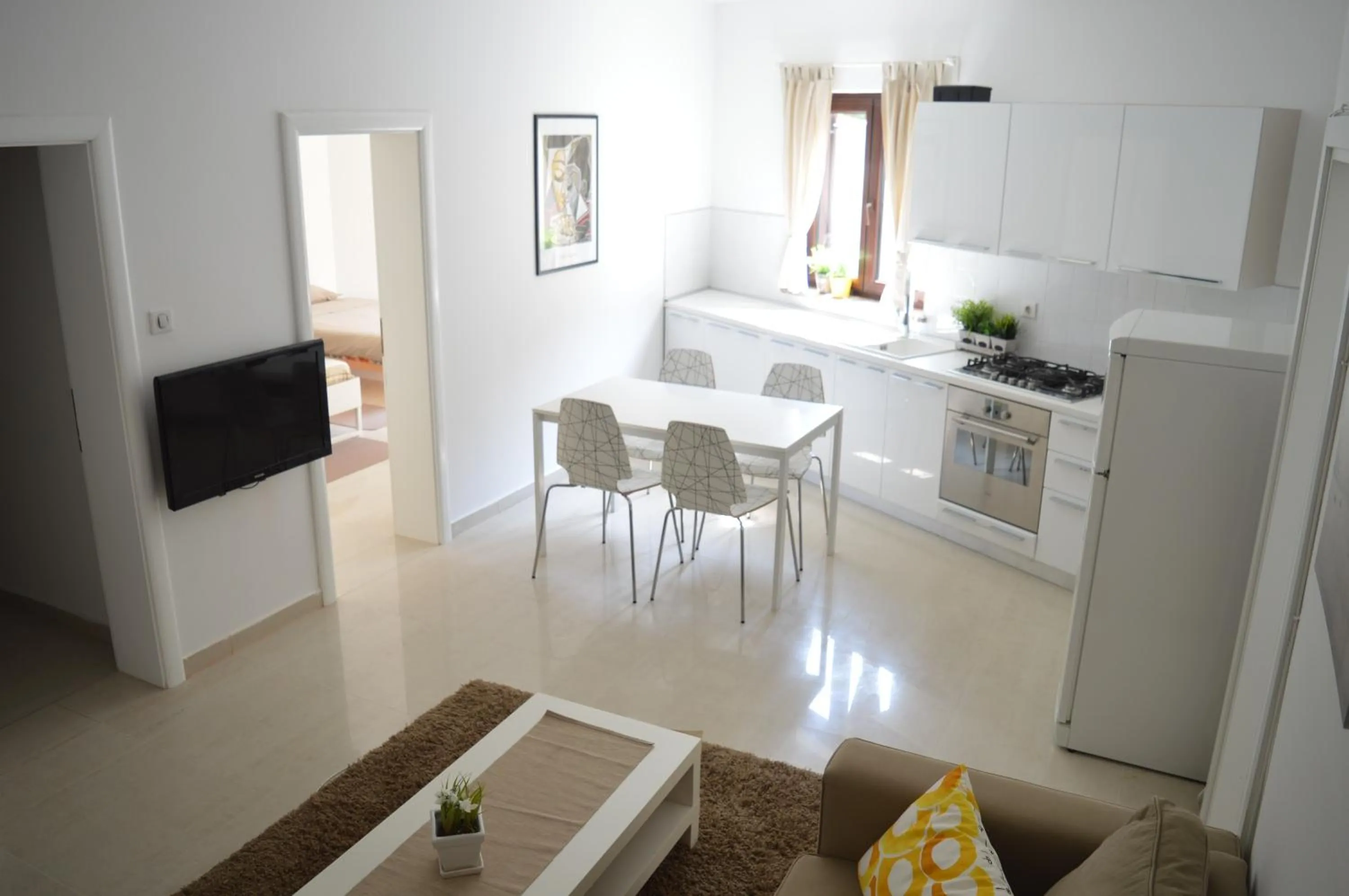 Kitchen or kitchenette in Apartments Villa Alba