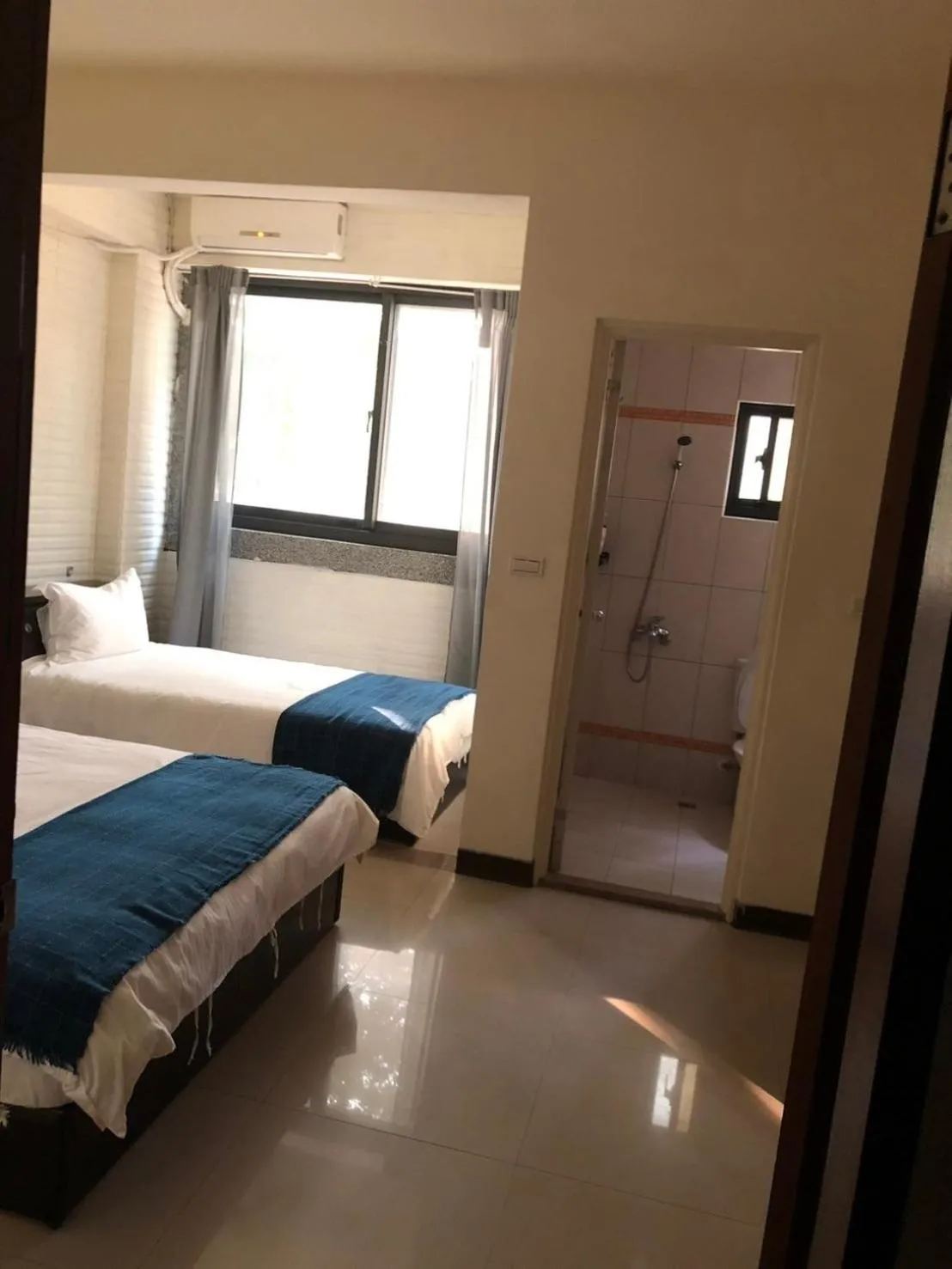 Triple Room with Private Bathroom in Yi Jia Homestay