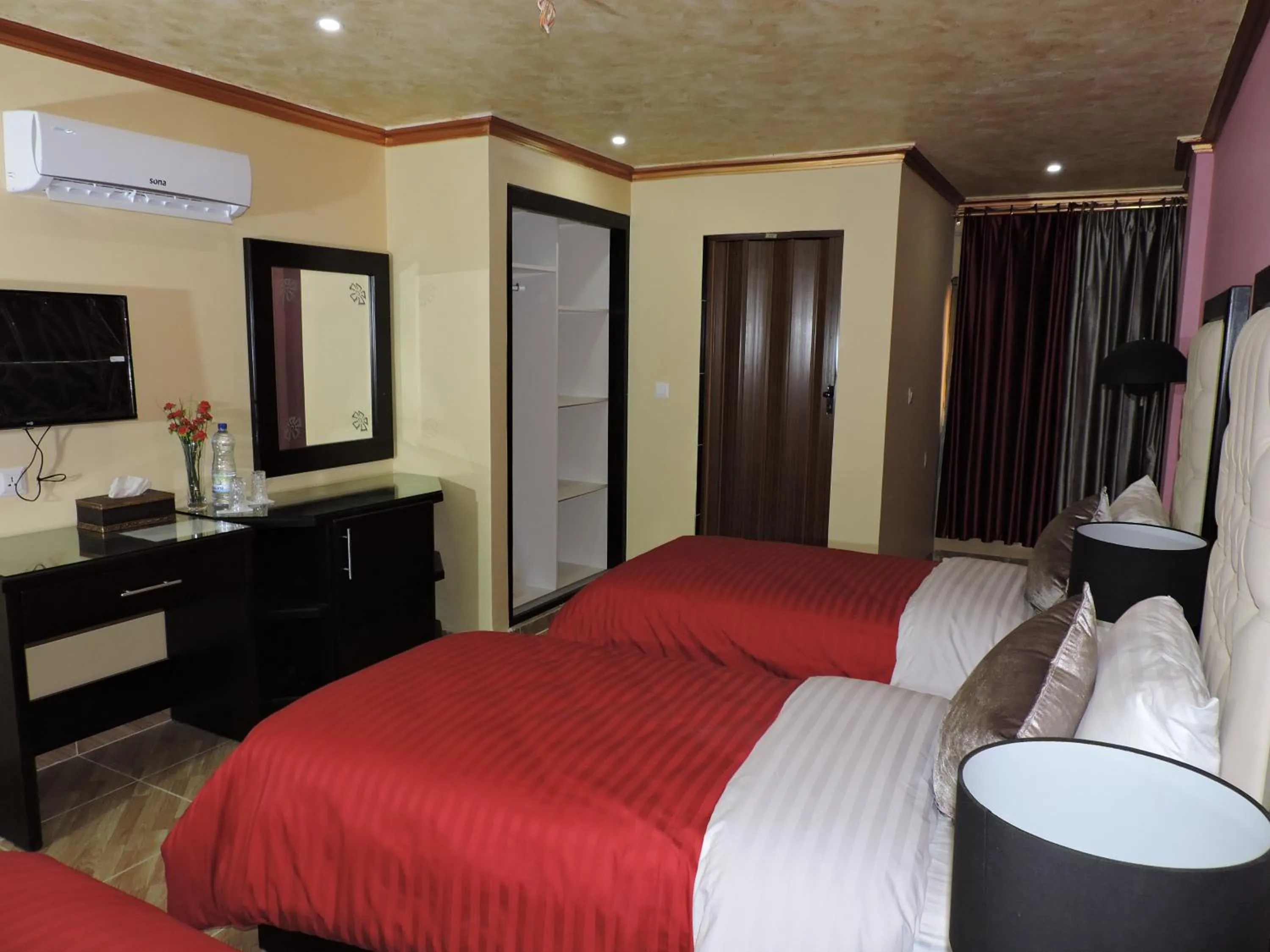 Bed in Valentine Inn Luxury