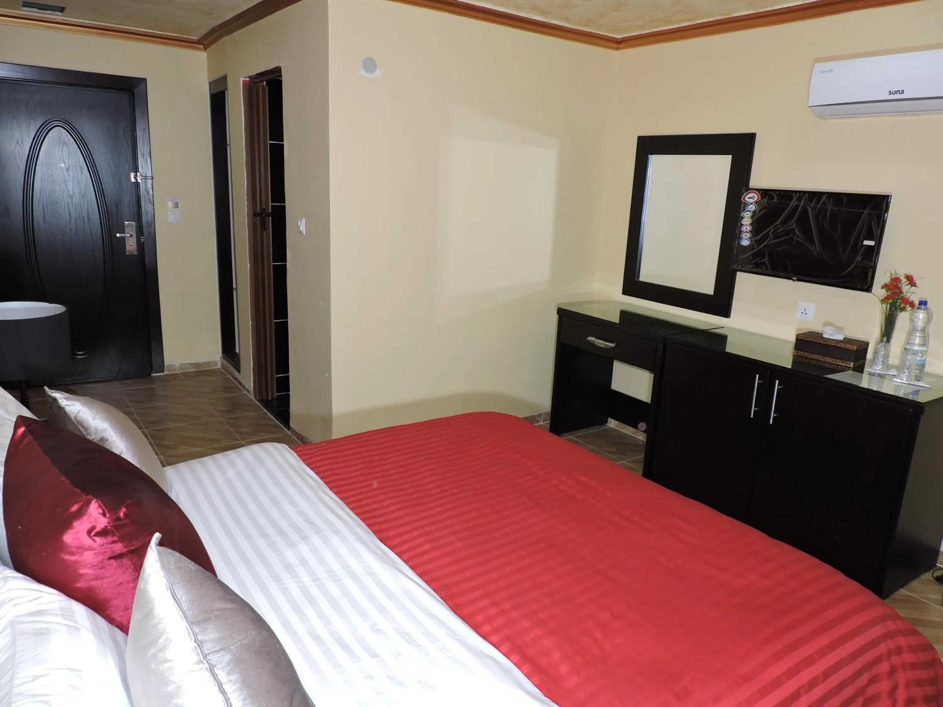 Bed in Valentine Inn Luxury