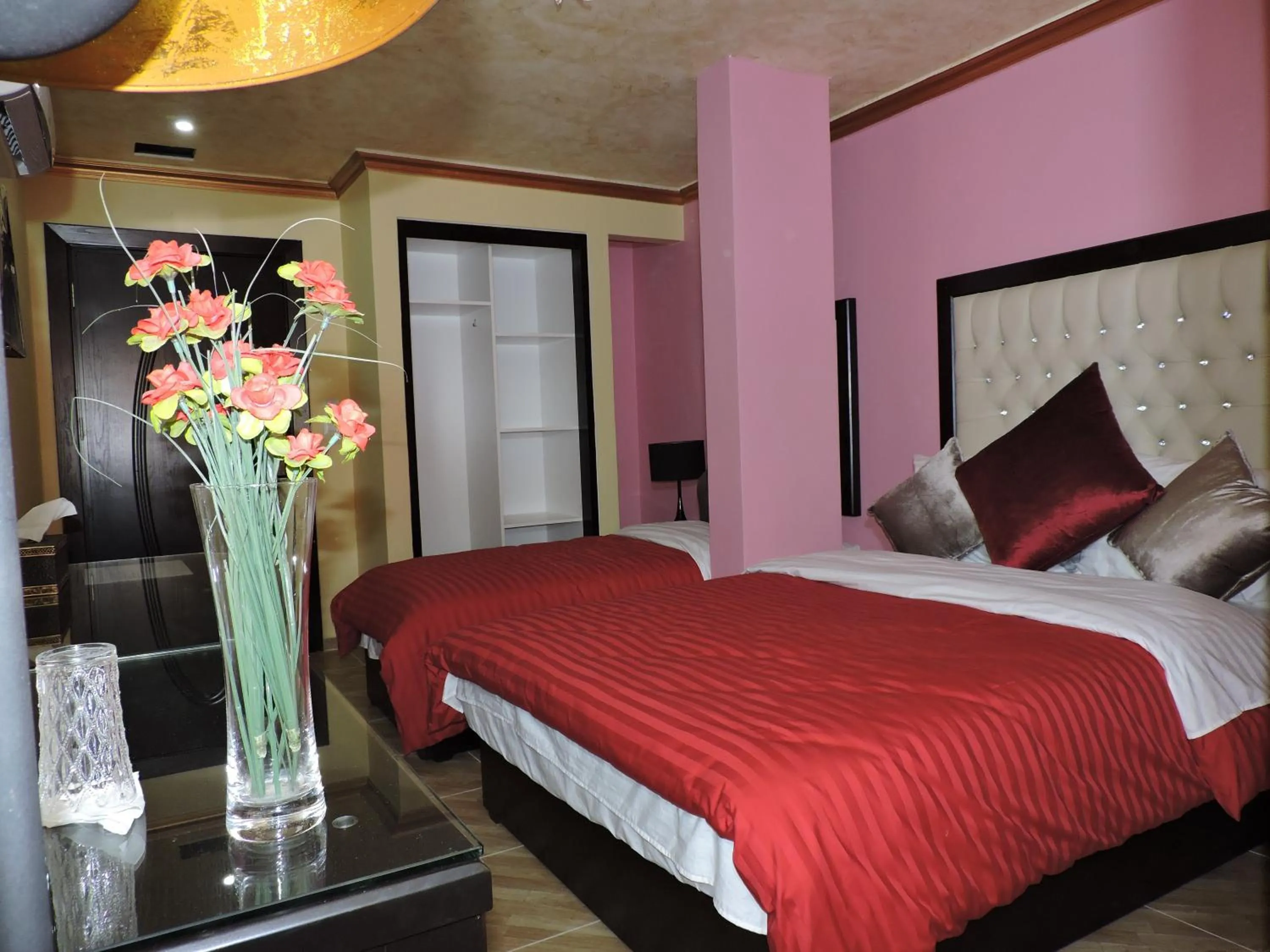 Bed in Valentine Inn Luxury